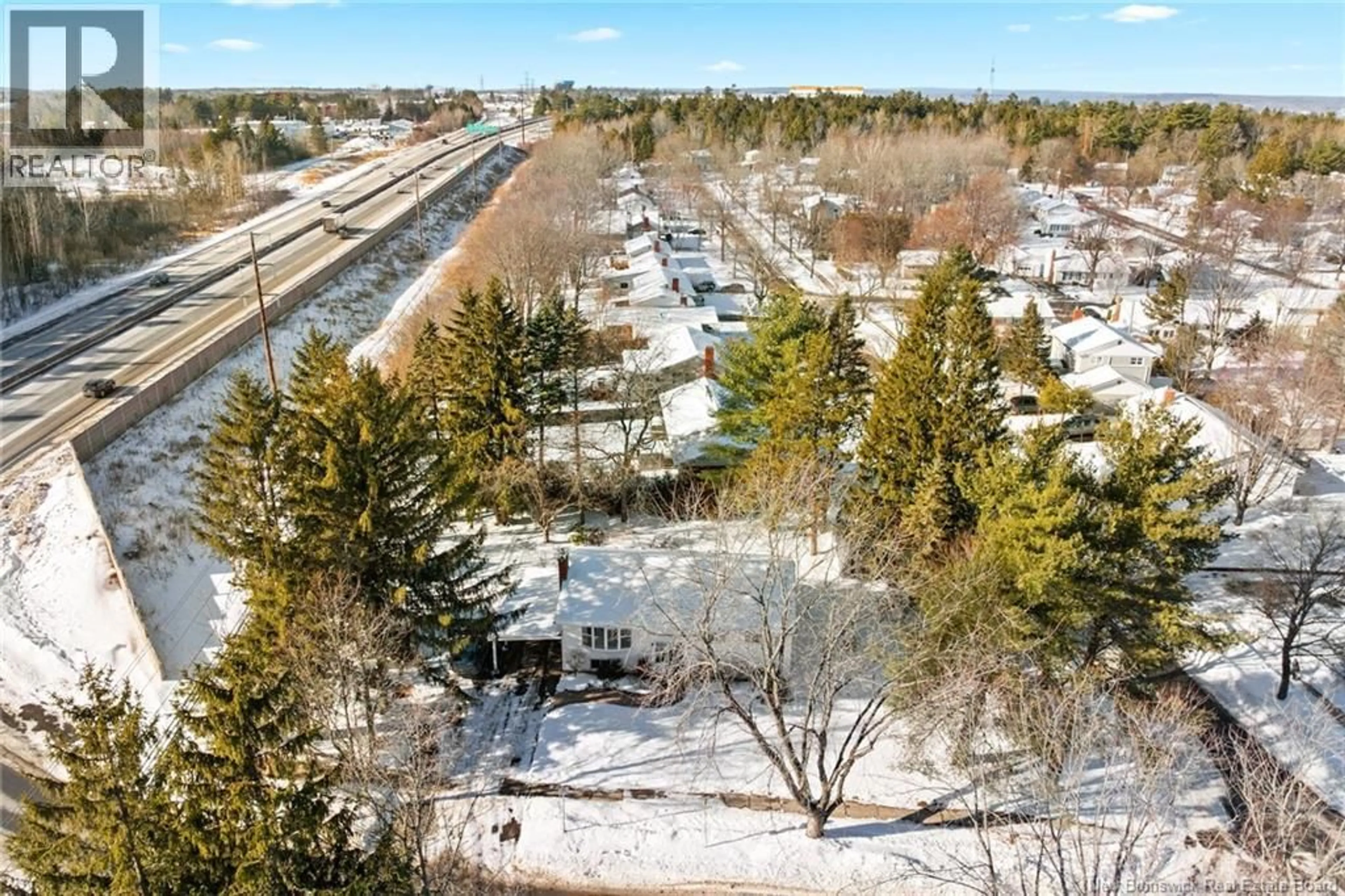 A pic from outside/outdoor area/front of a property/back of a property/a pic from drone, street for 215 LIVERPOOL STREET, Fredericton New Brunswick E3B4V7