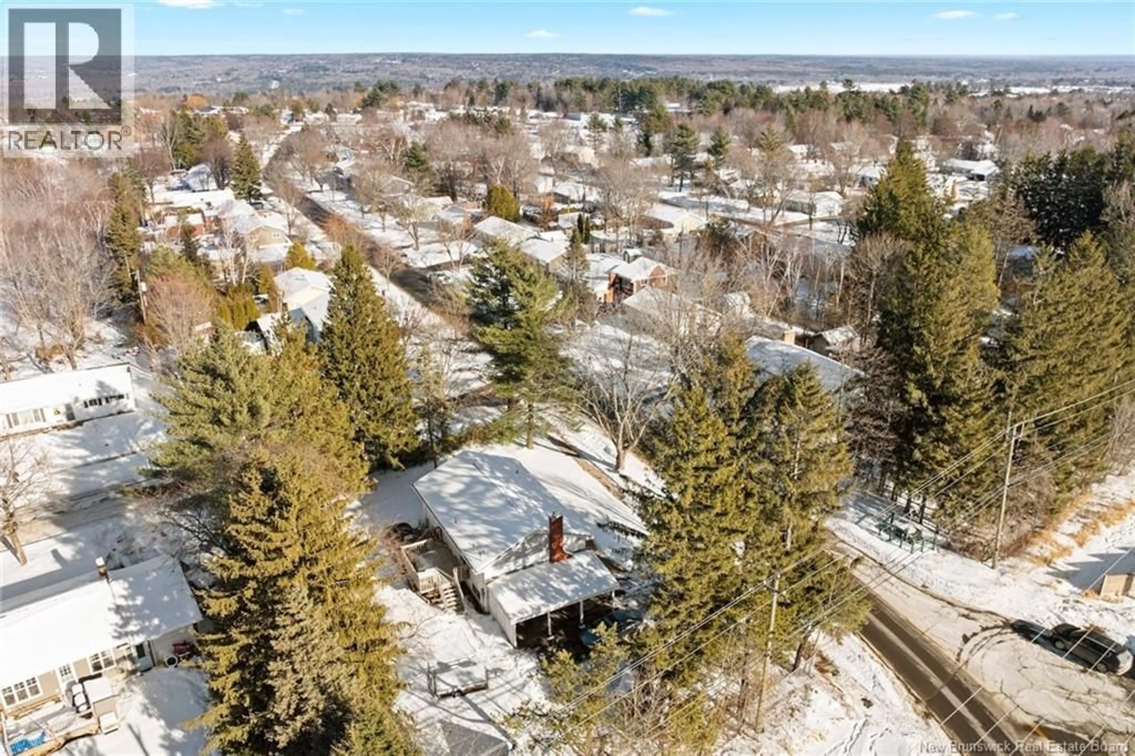 A pic from outside/outdoor area/front of a property/back of a property/a pic from drone, street for 215 LIVERPOOL STREET, Fredericton New Brunswick E3B4V7