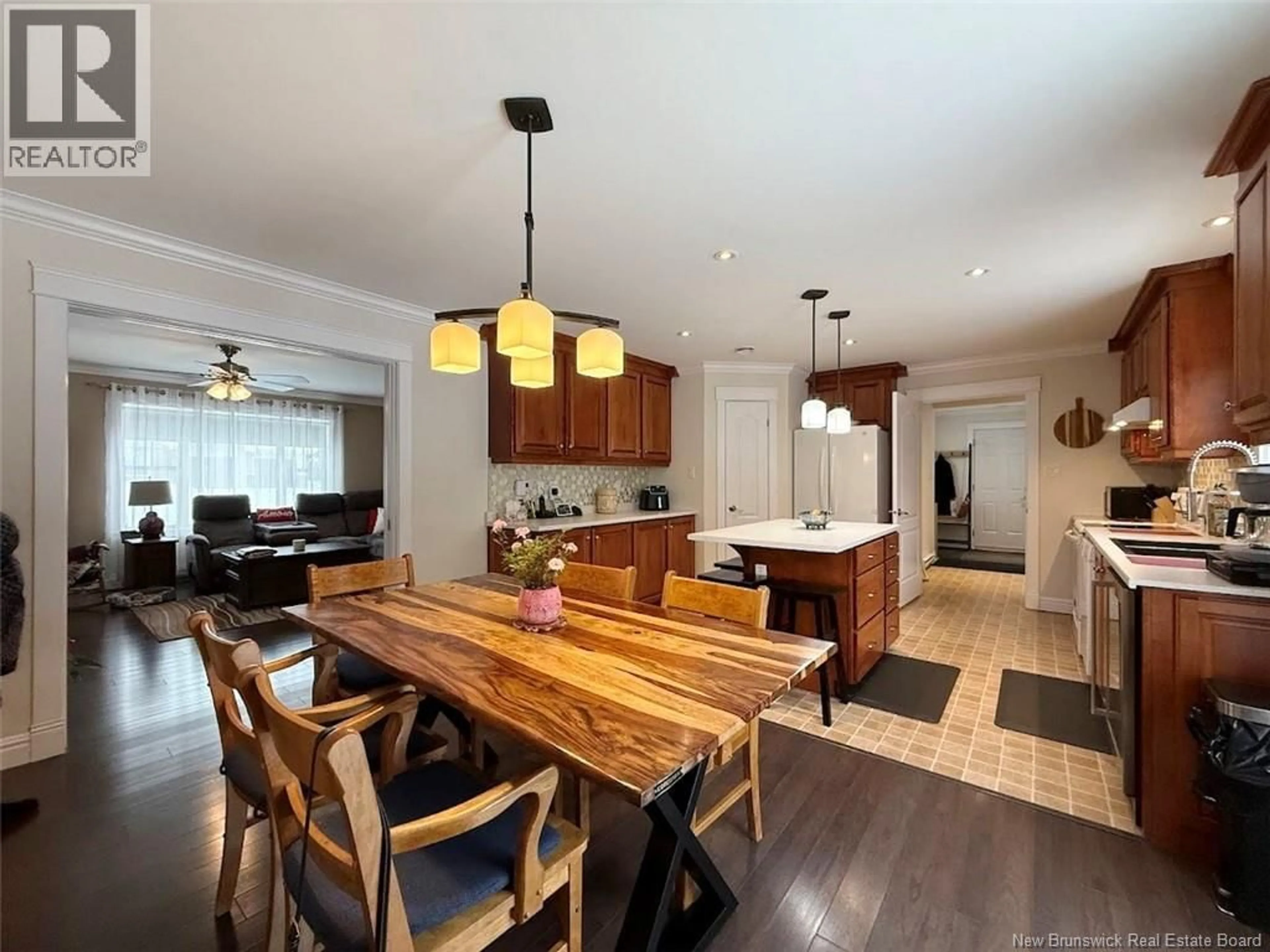 Open concept kitchen, wood/laminate floor for 23 GABRIEL STREET, Saint-Jacques New Brunswick E7B2Z9