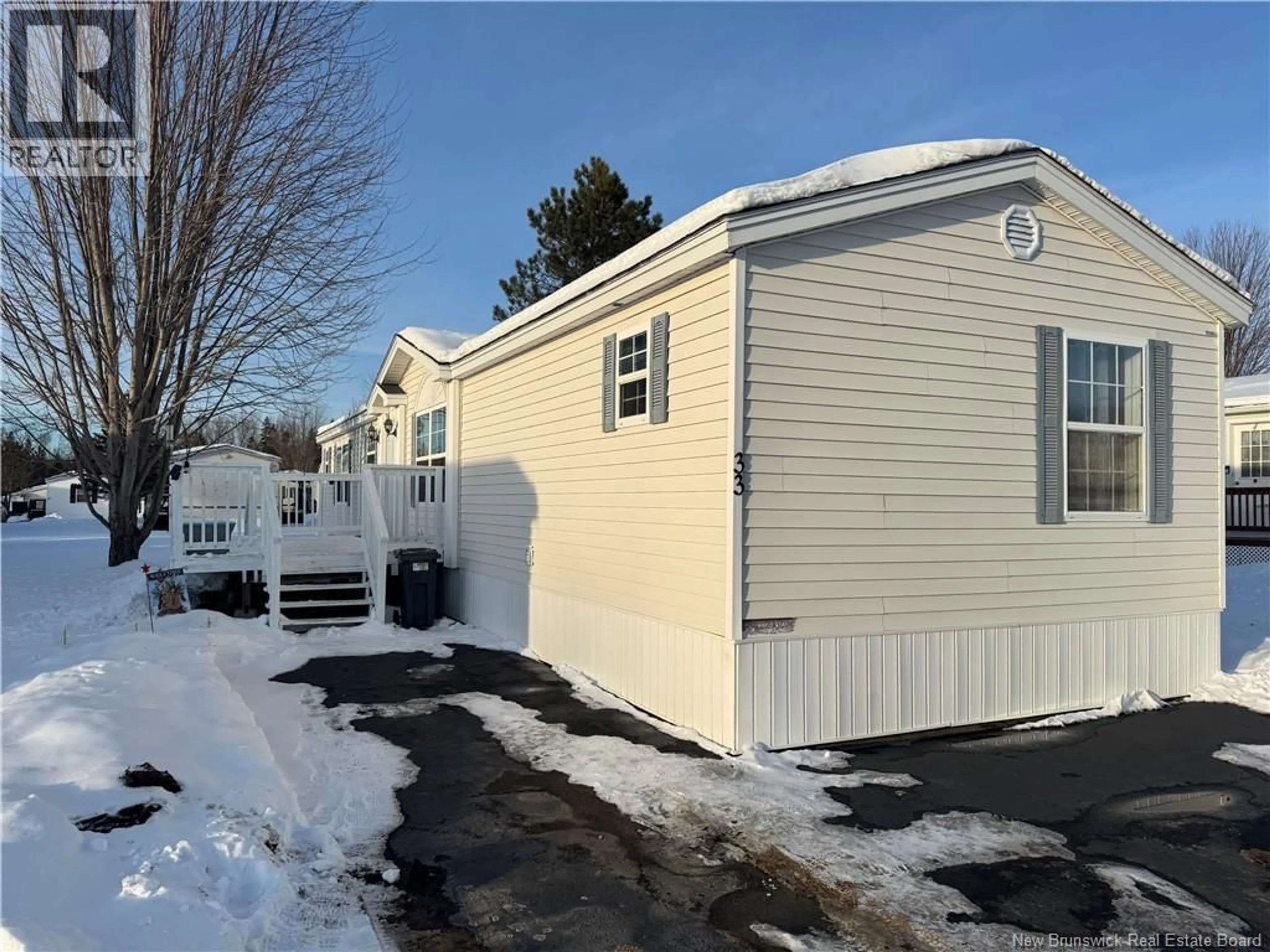 Home with vinyl exterior material, street for 33 FIRST STREET, Sussex Corner New Brunswick E4E2W2