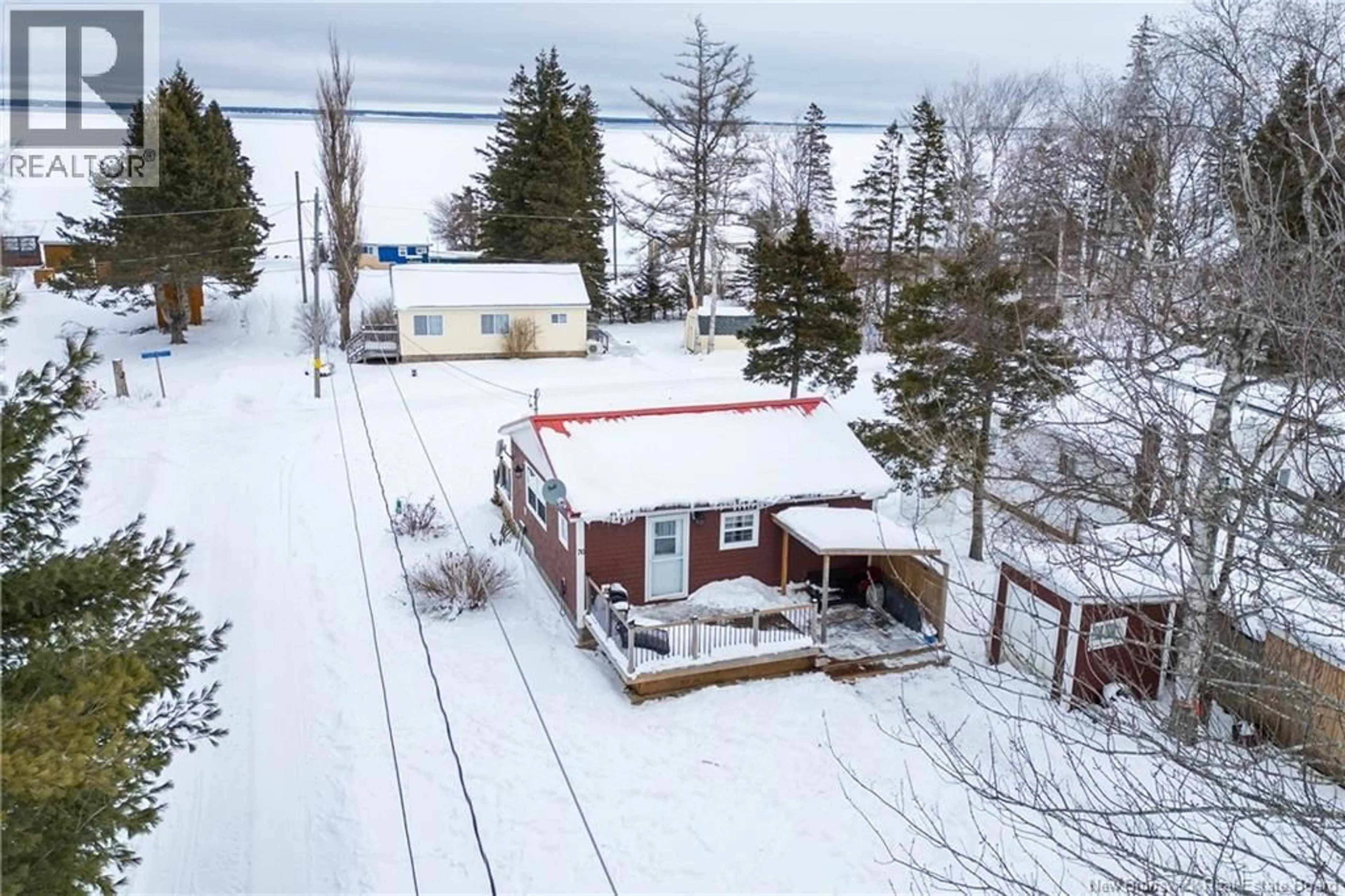 A pic from outside/outdoor area/front of a property/back of a property/a pic from drone, street for 76 WOODS BEACH LANE, Baie Verte New Brunswick E4M1N1