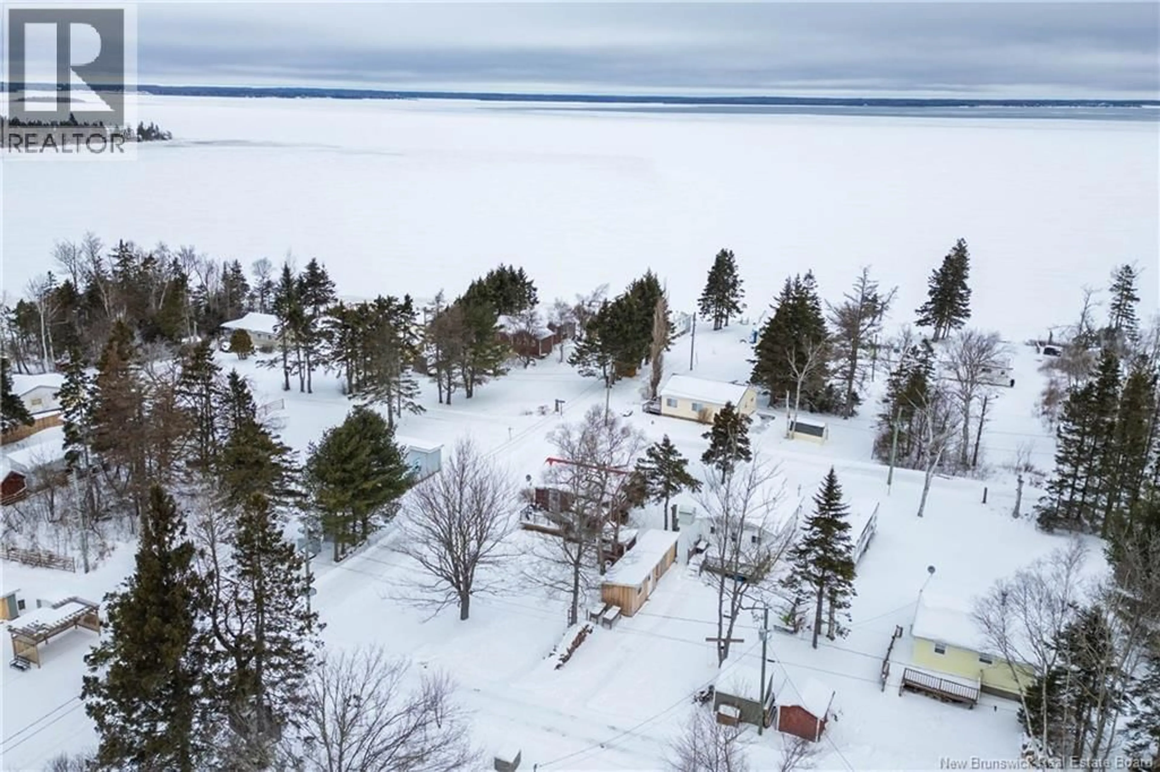 A pic from outside/outdoor area/front of a property/back of a property/a pic from drone, water/lake/river/ocean view for 76 WOODS BEACH LANE, Baie Verte New Brunswick E4M1N1