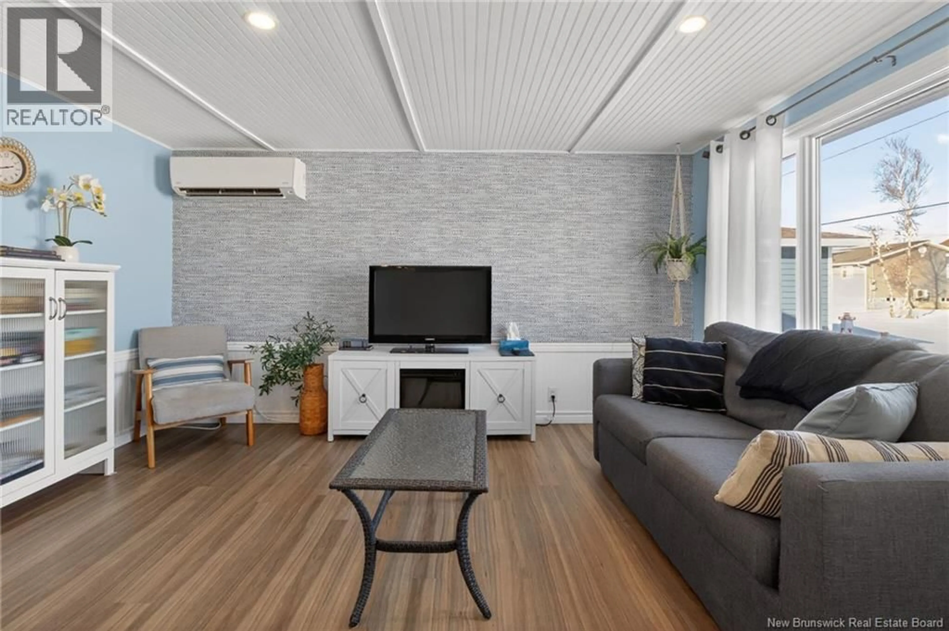 Living room with furniture, unknown for 57 BAYBREEZE LANE, Grand-Barachois New Brunswick E4P6W9