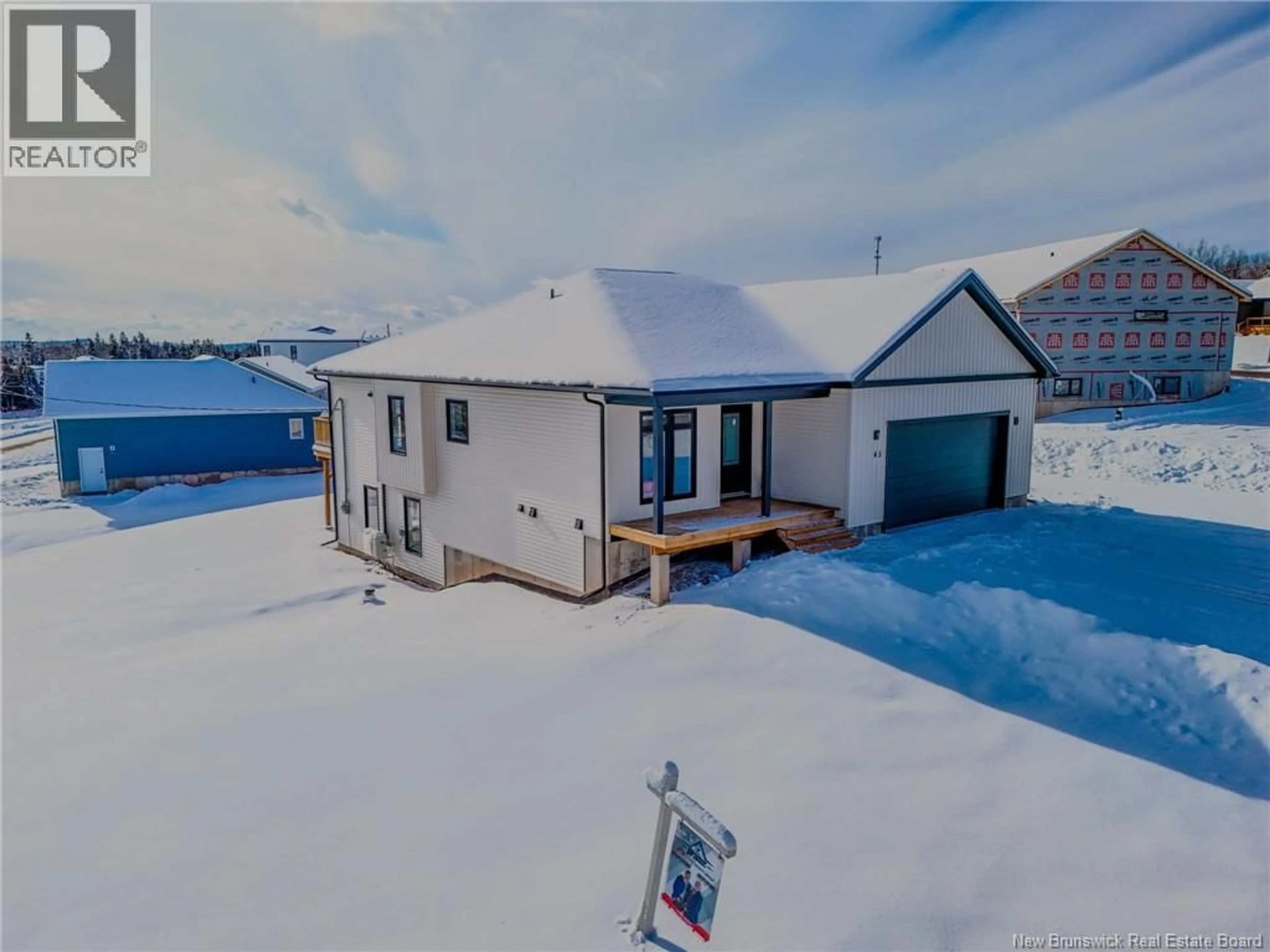 A pic from outside/outdoor area/front of a property/back of a property/a pic from drone, street for 45 MERLIN DRIVE, Quispamsis New Brunswick E2E0Y5