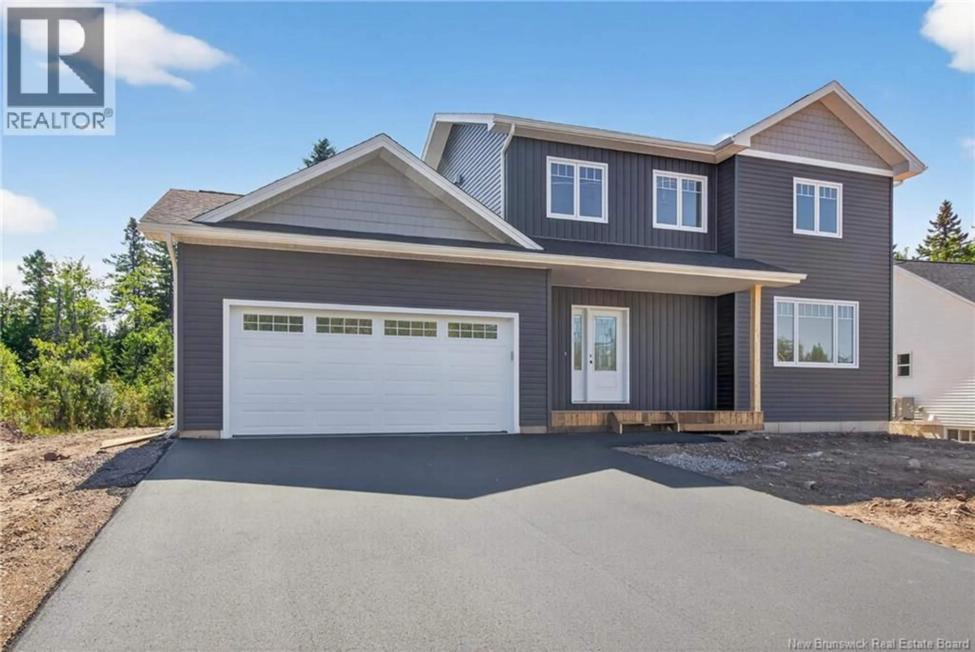 Home with vinyl exterior material, street for 26 CARTER STREET, Dieppe New Brunswick E1A0G4