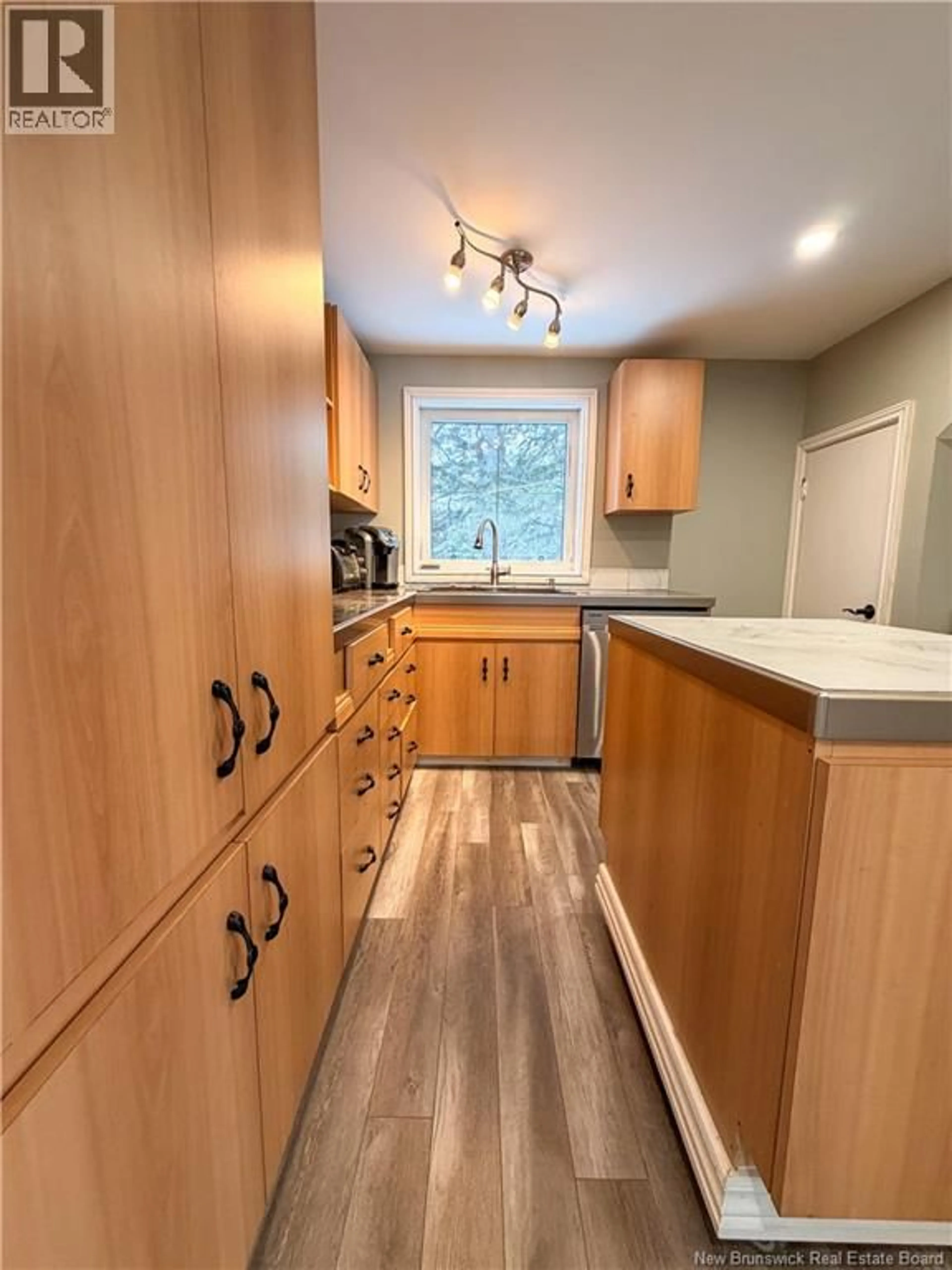 Standard kitchen, wood/laminate floor for 490 CHALEUR STREET, Charlo New Brunswick E8E2G5