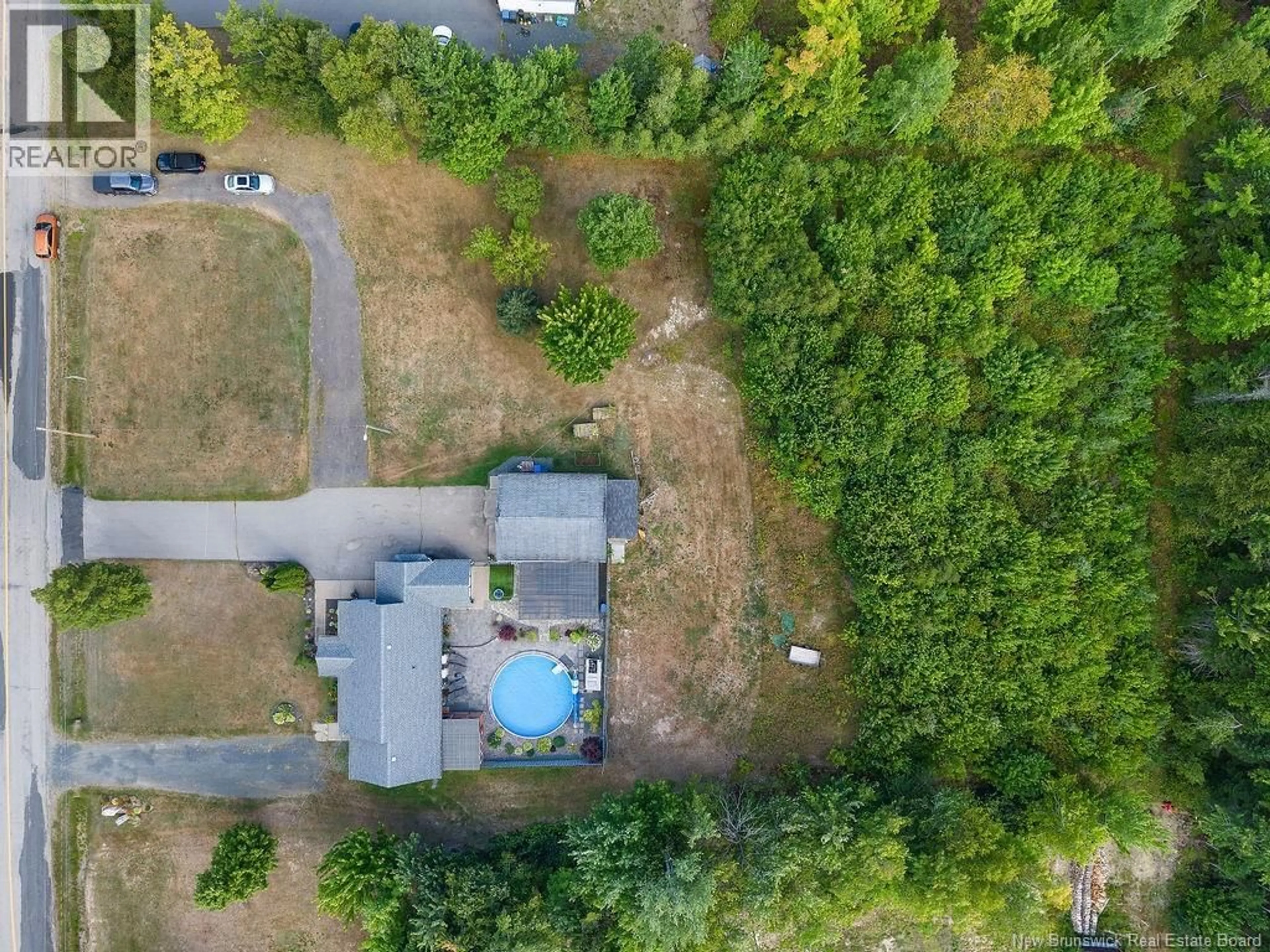 A pic from outside/outdoor area/front of a property/back of a property/a pic from drone, forest/trees view for 1196 ROUTE 455, Caissie Road New Brunswick E9G2Z5