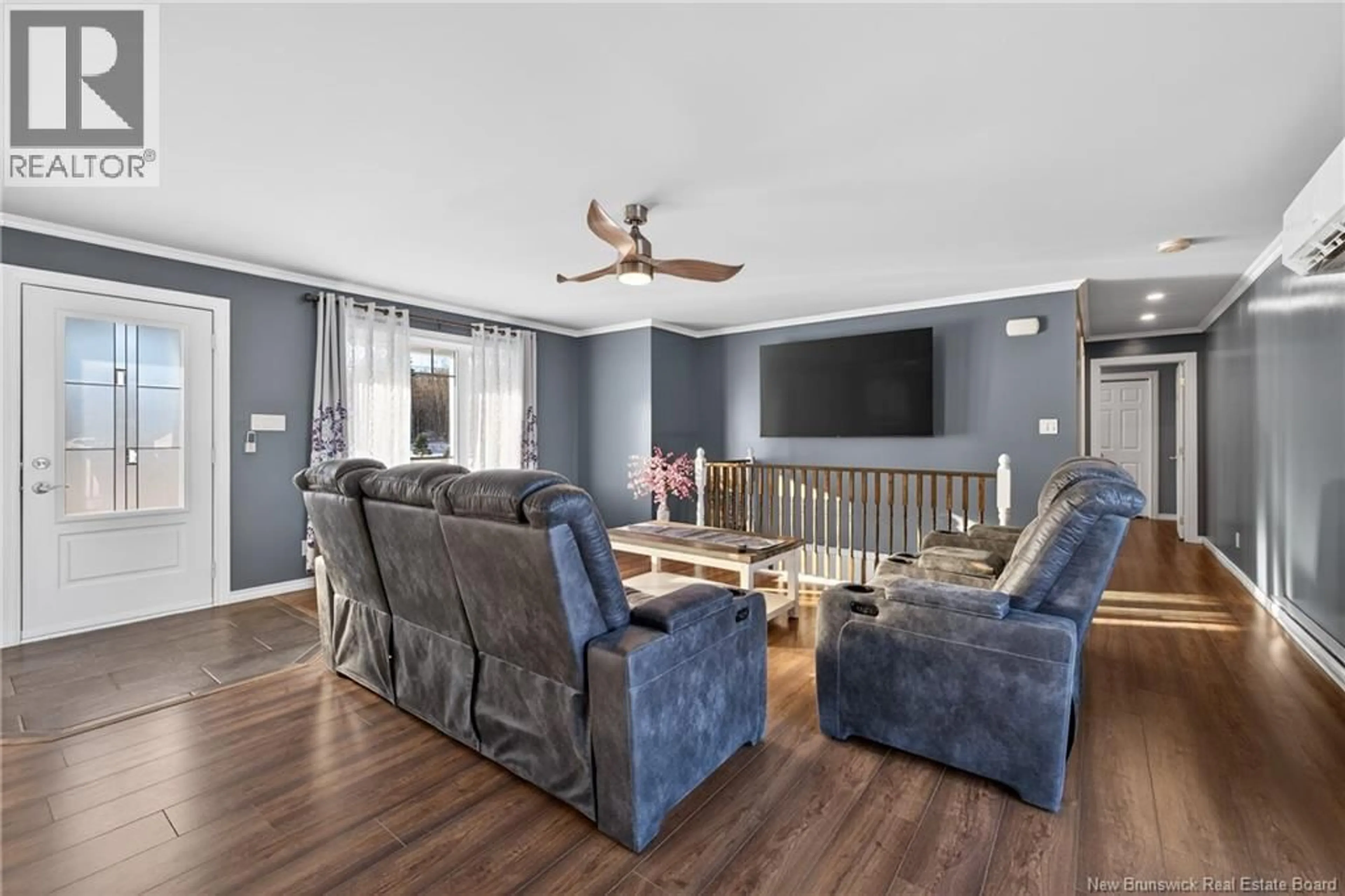 Living room with furniture, wood/laminate floor for 1243 CH VAL-DOUCET CH, Val-Doucet New Brunswick E8R2A5