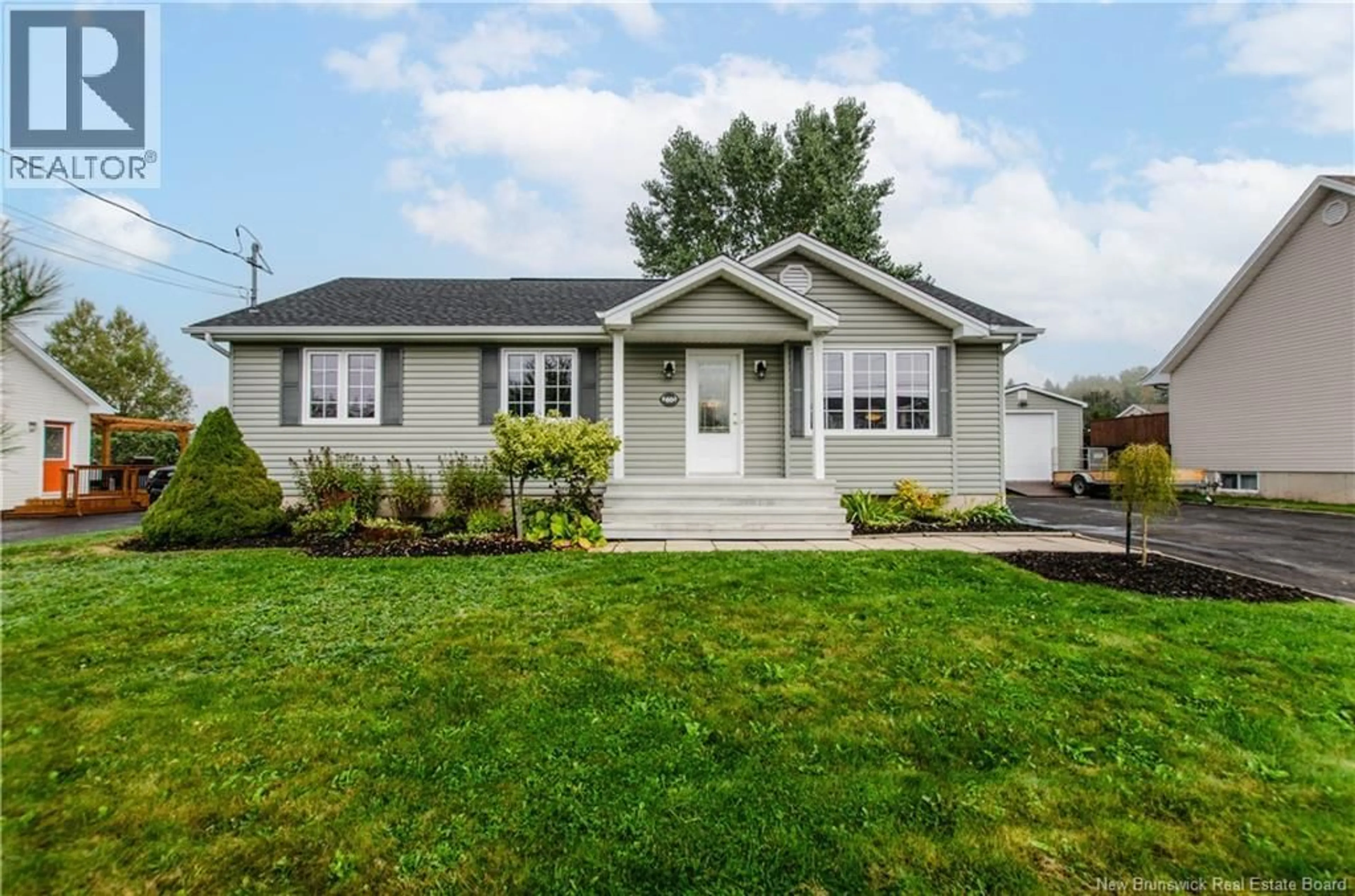 Home with vinyl exterior material, street for 60 NICOLAS STREET, Dieppe New Brunswick E1A8L7