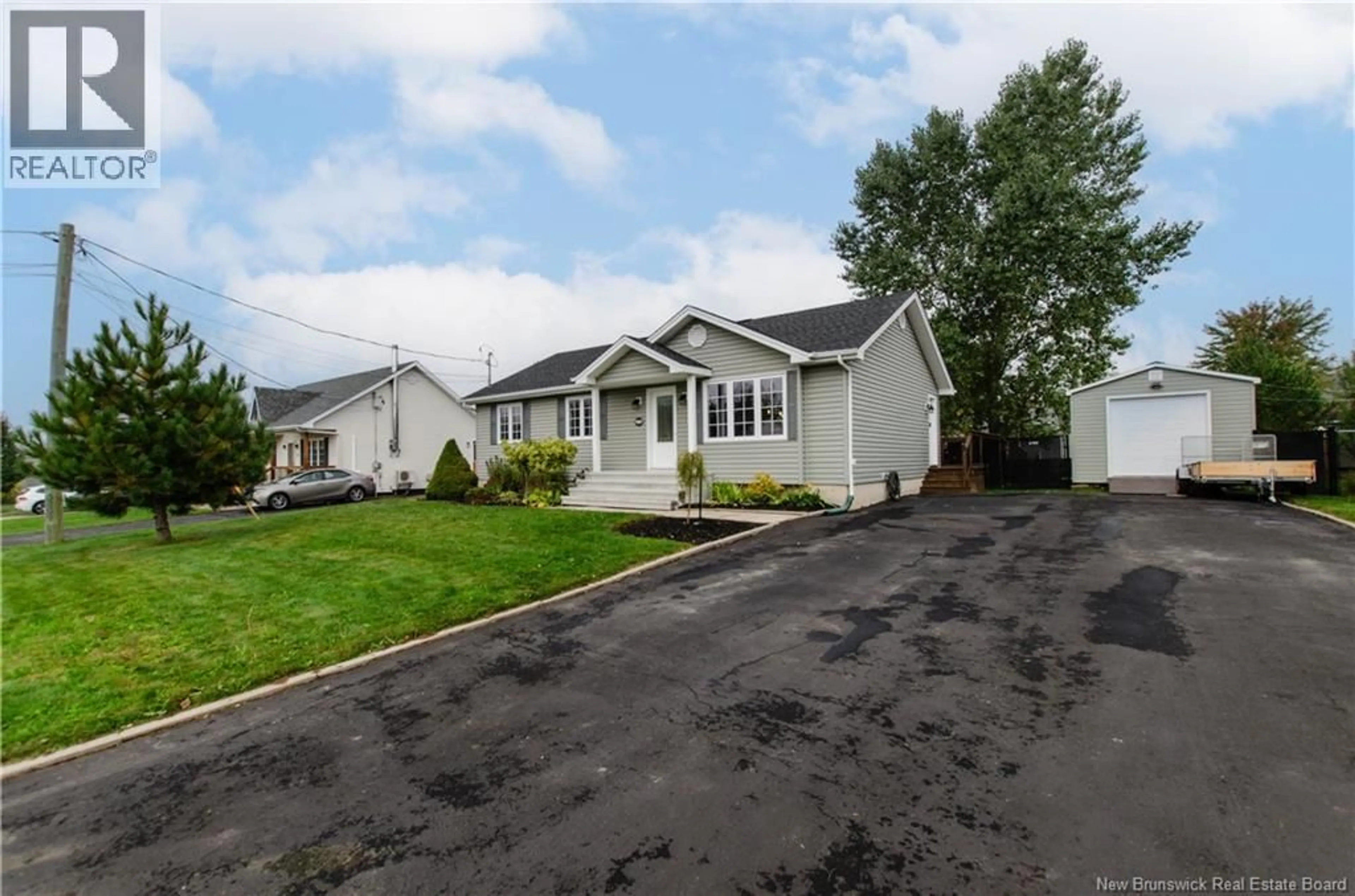 Home with vinyl exterior material, street for 60 NICOLAS STREET, Dieppe New Brunswick E1A8L7