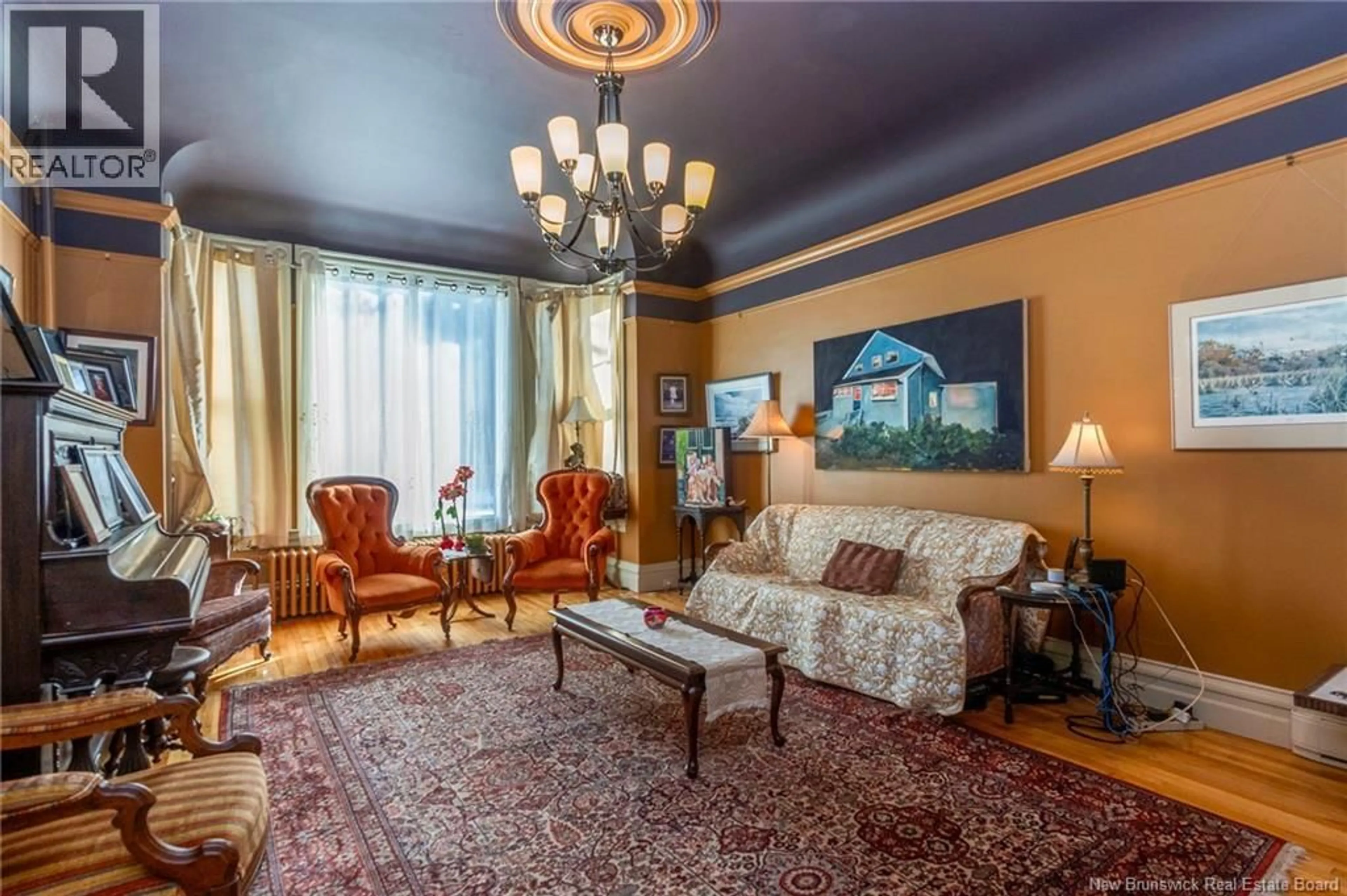 Living room with furniture, carpet floor for 127-129 KING STREET, Saint John New Brunswick E2L1G8