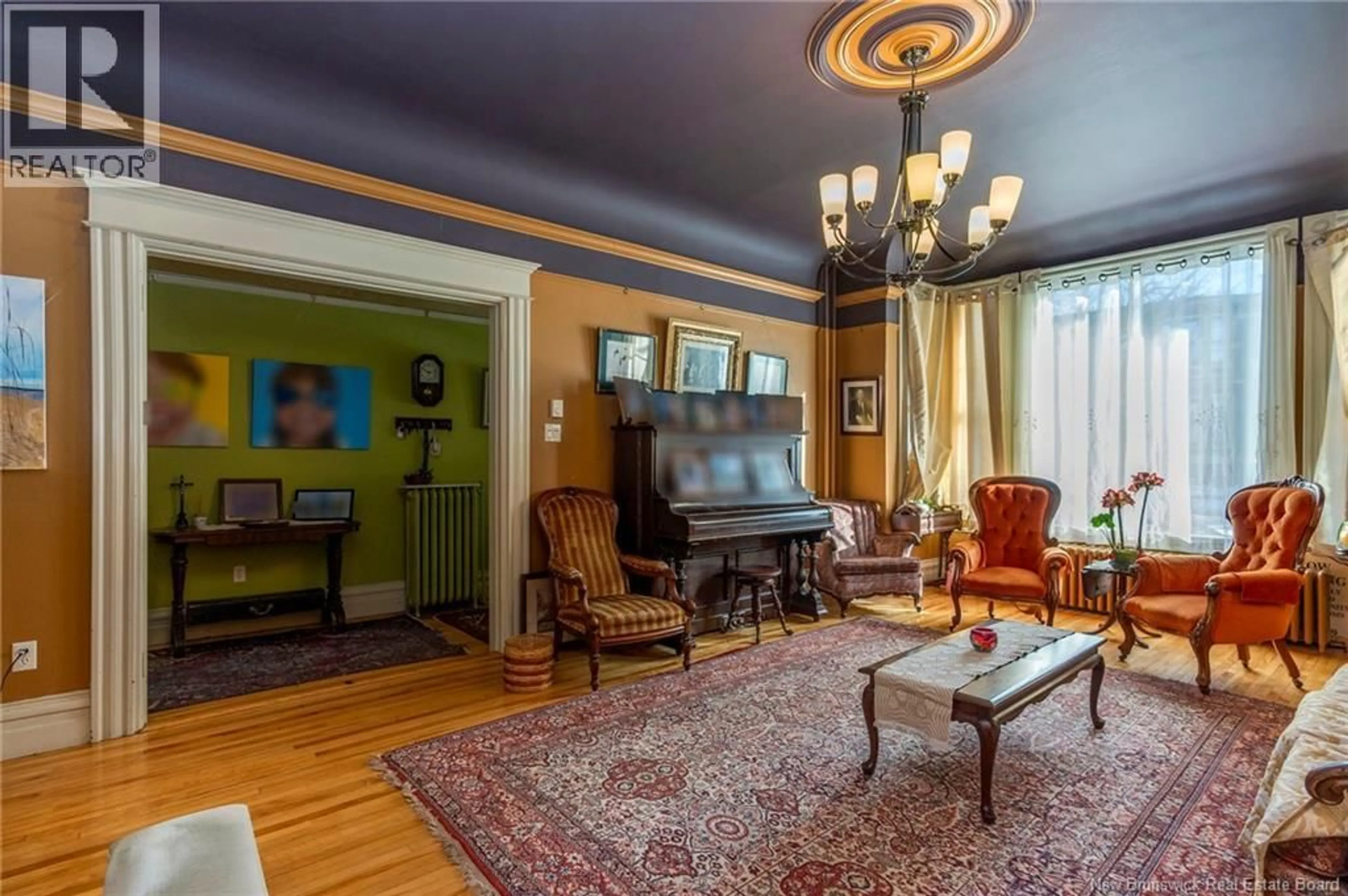 Living room with furniture, unknown for 127-129 KING STREET, Saint John New Brunswick E2L1G8