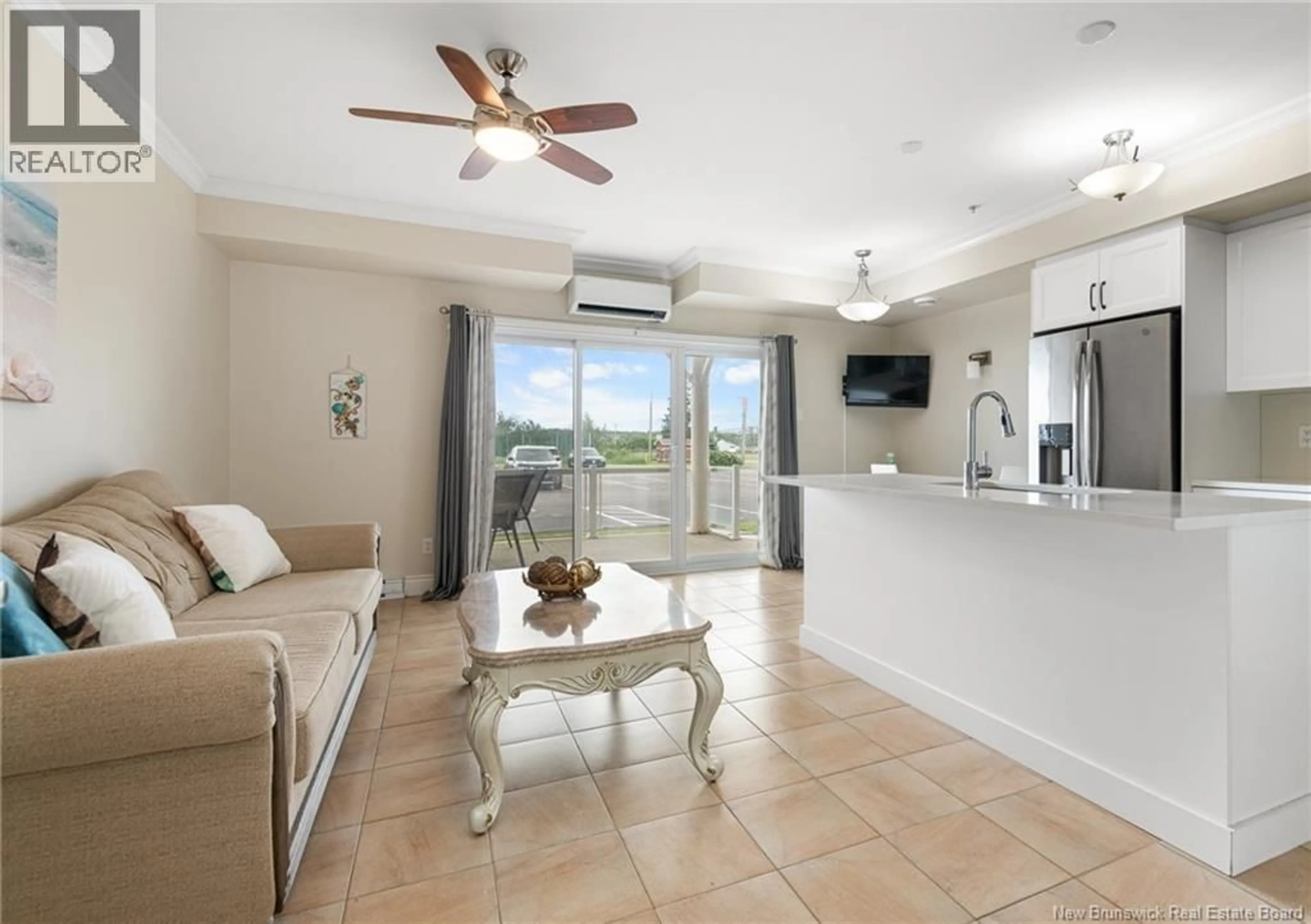 Living room with furniture, ceramic/tile floor for 119 - 69 CAP BIMET BOULEVARD, Grand-Barachois New Brunswick E4P6X5