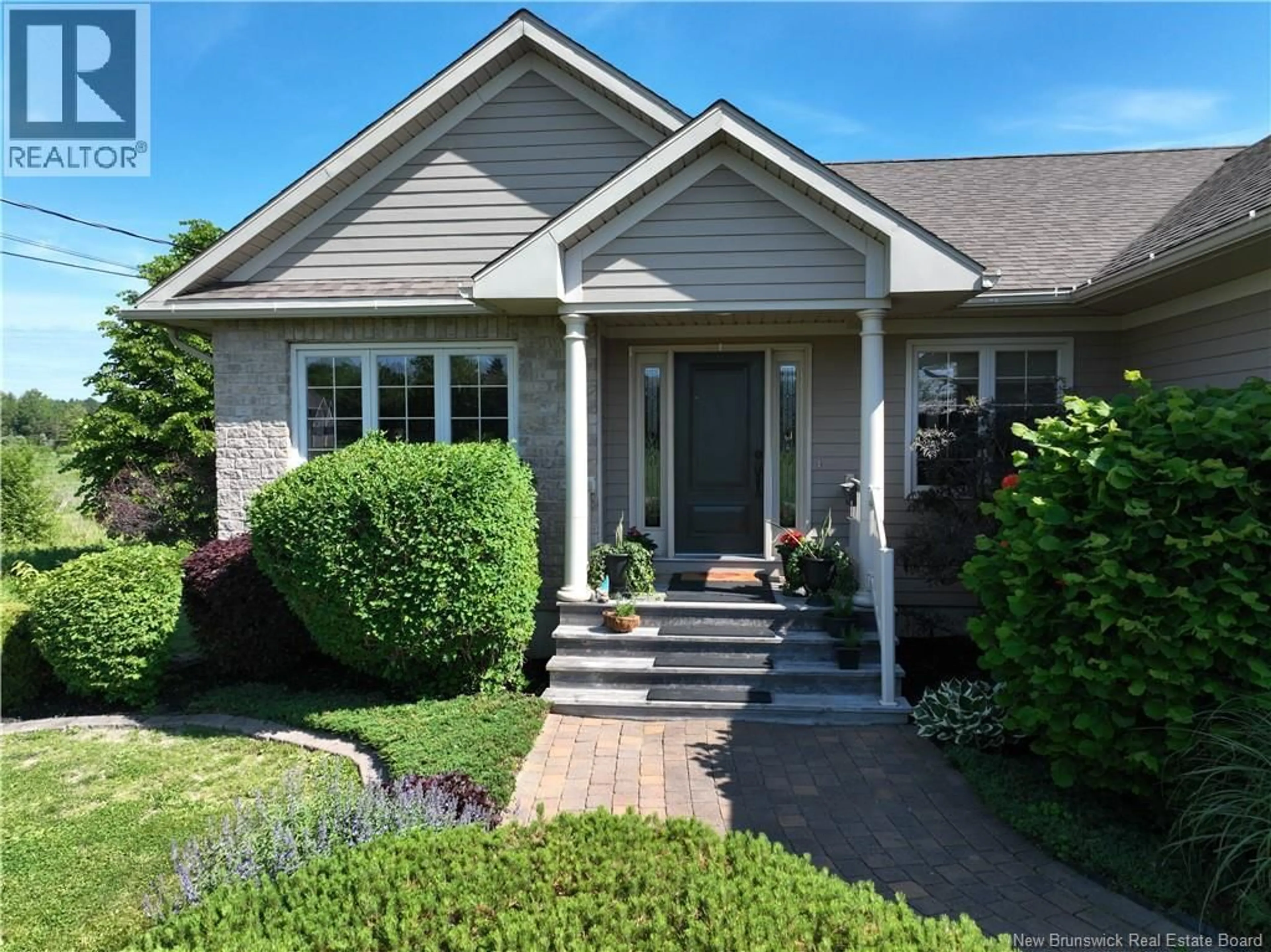 Home with vinyl exterior material, street for 5 GROOM STREET, St. Stephen New Brunswick E3L0A7