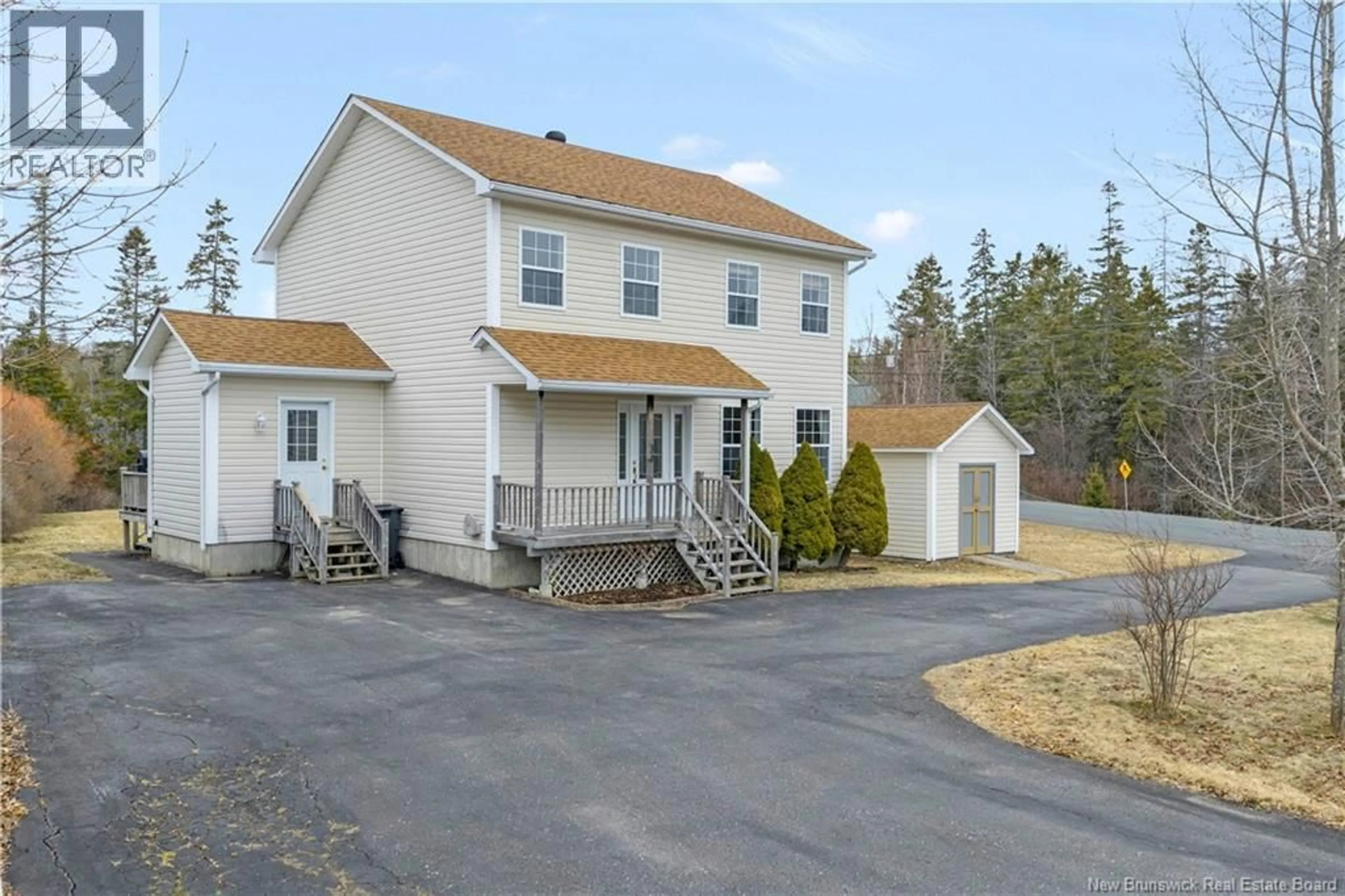 A pic from outside/outdoor area/front of a property/back of a property/a pic from drone, street for 34 DUNN AVENUE, Saint Andrews New Brunswick E5B3V5