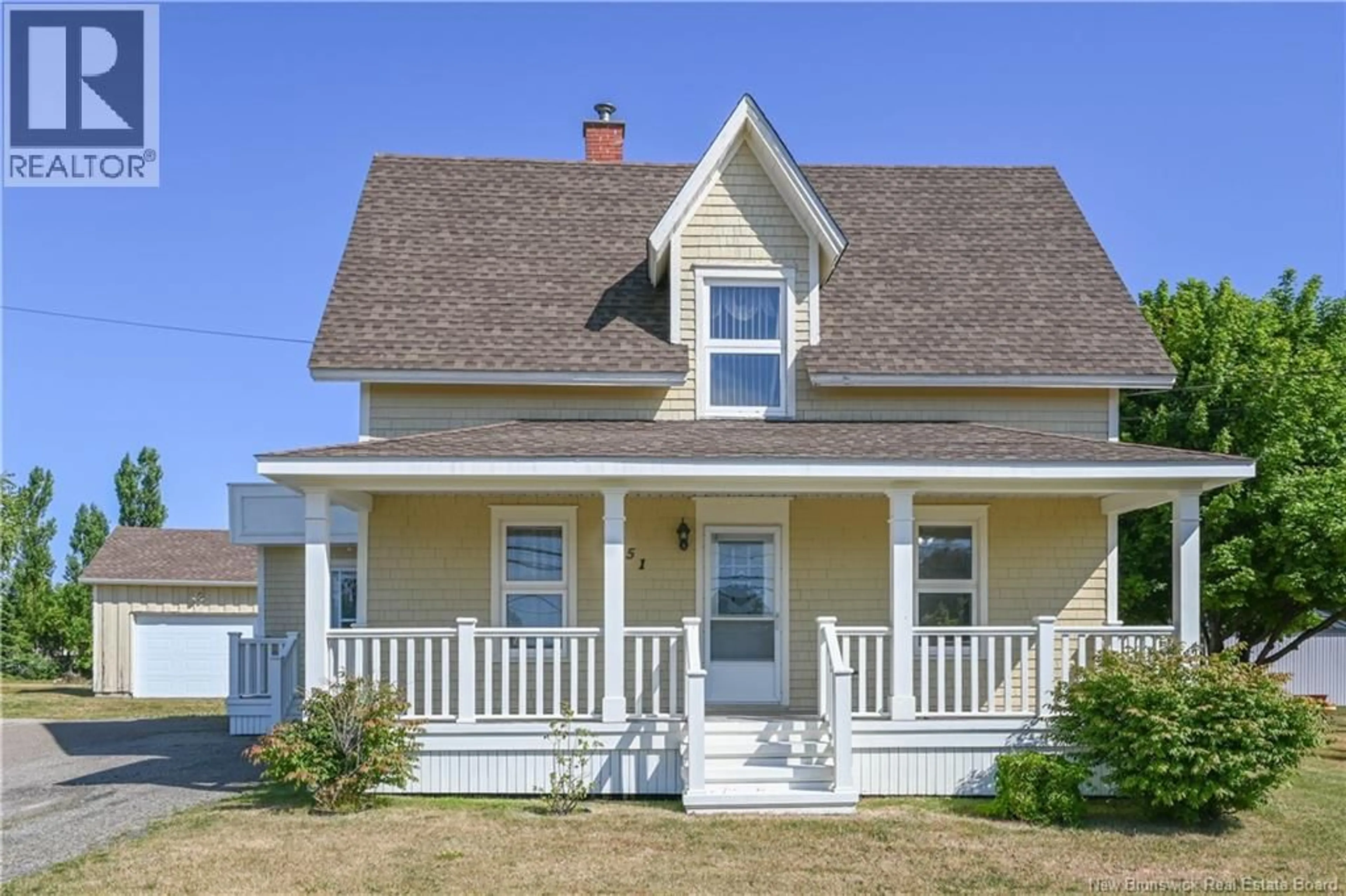 Home with vinyl exterior material, street for 351 SAINT-PIERRE BOULEVARD, Caraquet New Brunswick E1W1B4