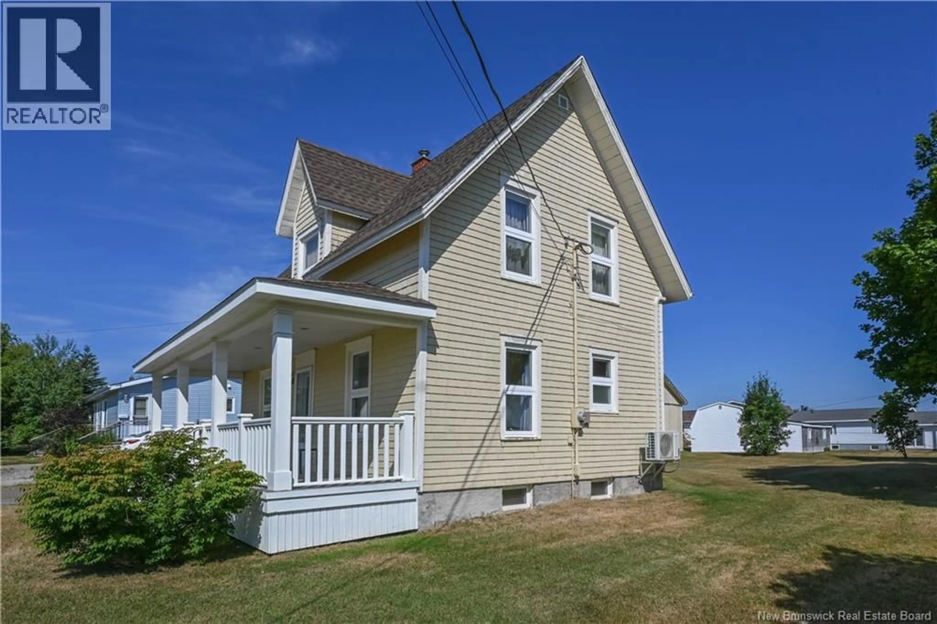 Home with vinyl exterior material, street for 351 SAINT-PIERRE BOULEVARD, Caraquet New Brunswick E1W1B4