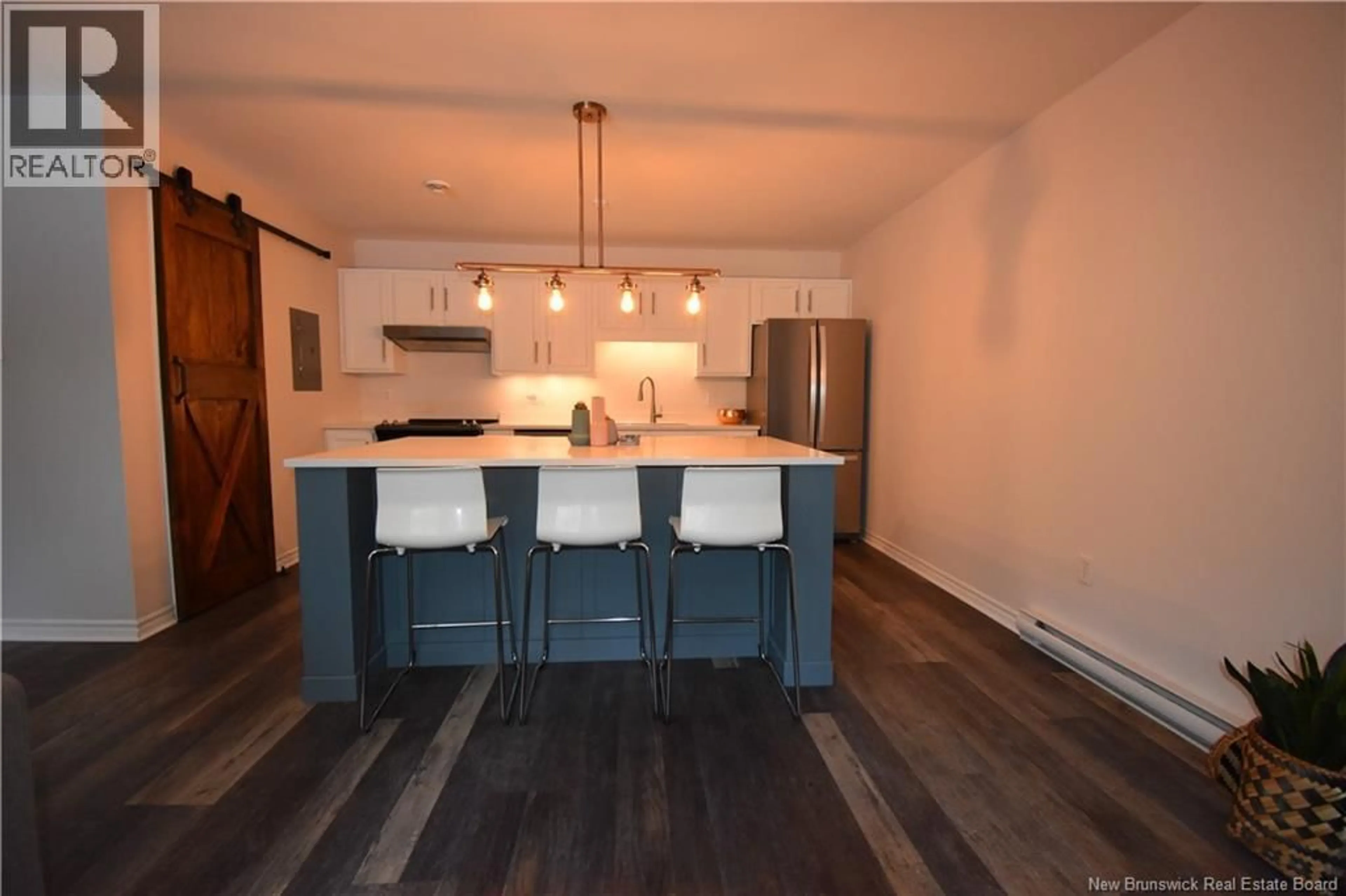 Open concept kitchen, wood/laminate floor for 19 - 20 WOODHOLLOW, Saint John New Brunswick E2J0B7