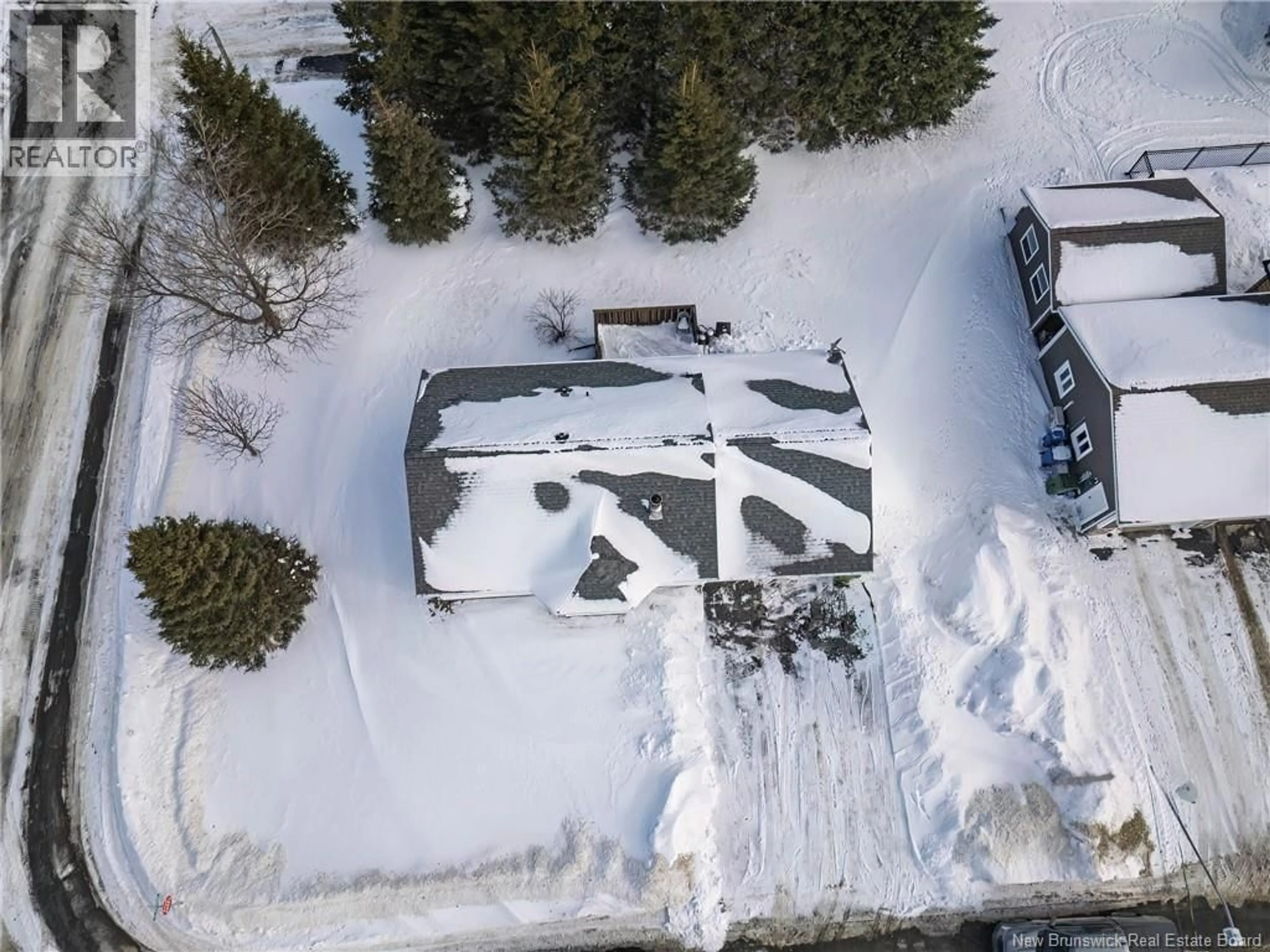 A pic from outside/outdoor area/front of a property/back of a property/a pic from drone, street for 47 RUE DES ERABLES, Saint-André New Brunswick E3Y2Z7