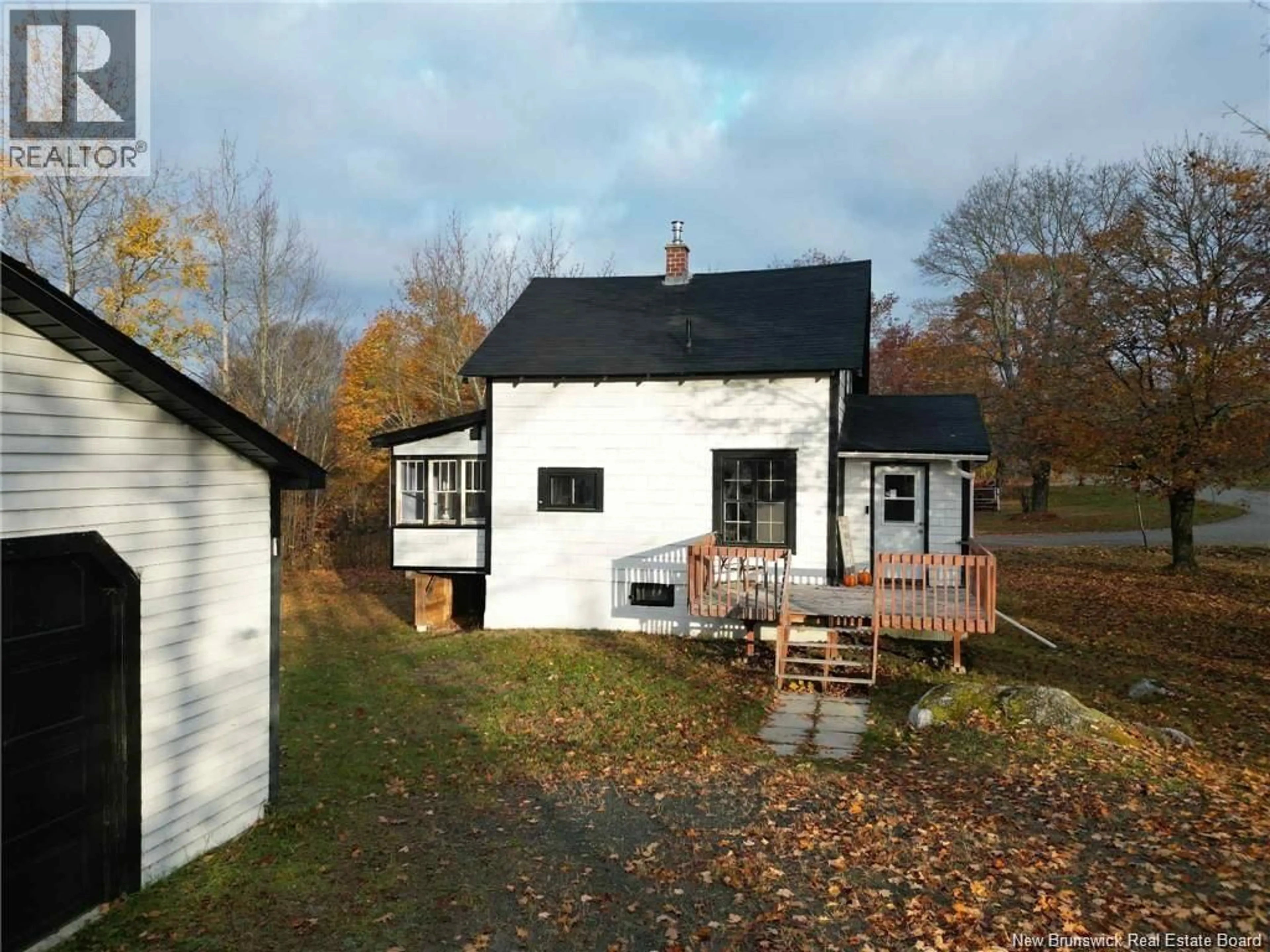 A pic from outside/outdoor area/front of a property/back of a property/a pic from drone, building for 54 PLEASANT AVENUE, McAdam New Brunswick E6J1G4