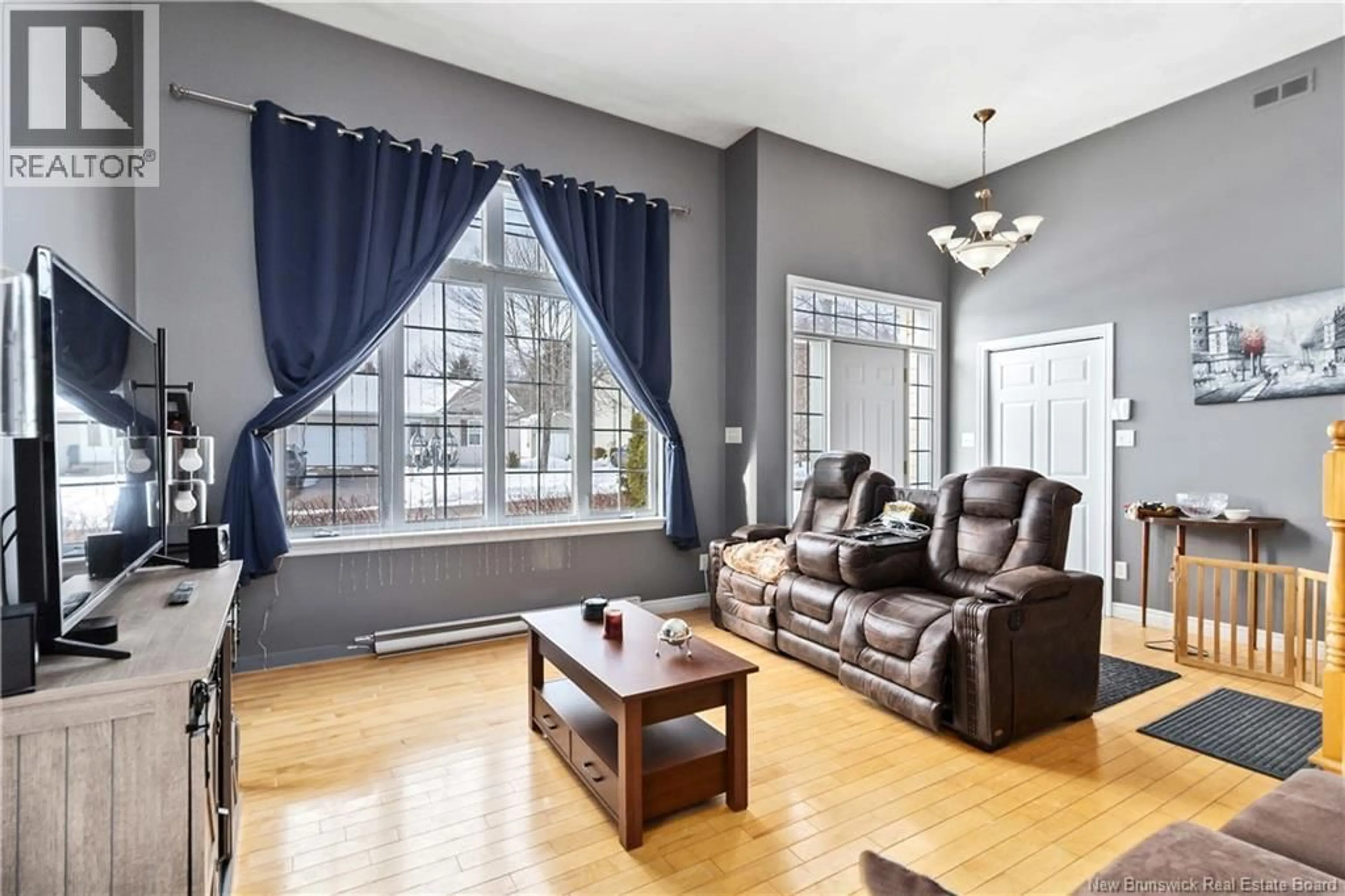 Living room with furniture, unknown for 33 LOTUSROW DRIVE, Moncton New Brunswick E1E4W1