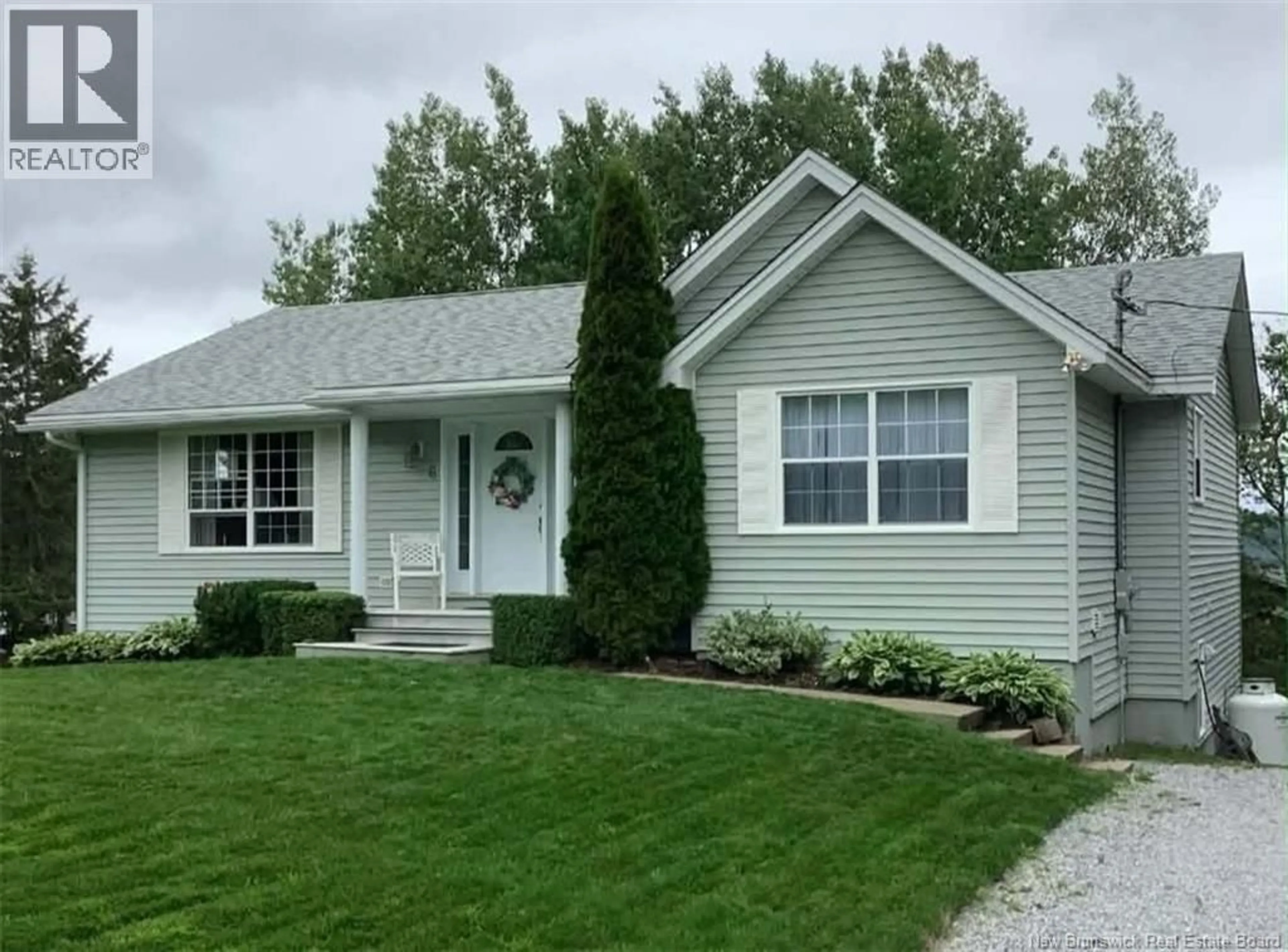 Home with vinyl exterior material, street for 6 MCMASTER AVENUE, Nauwigewauk New Brunswick E5N2B7