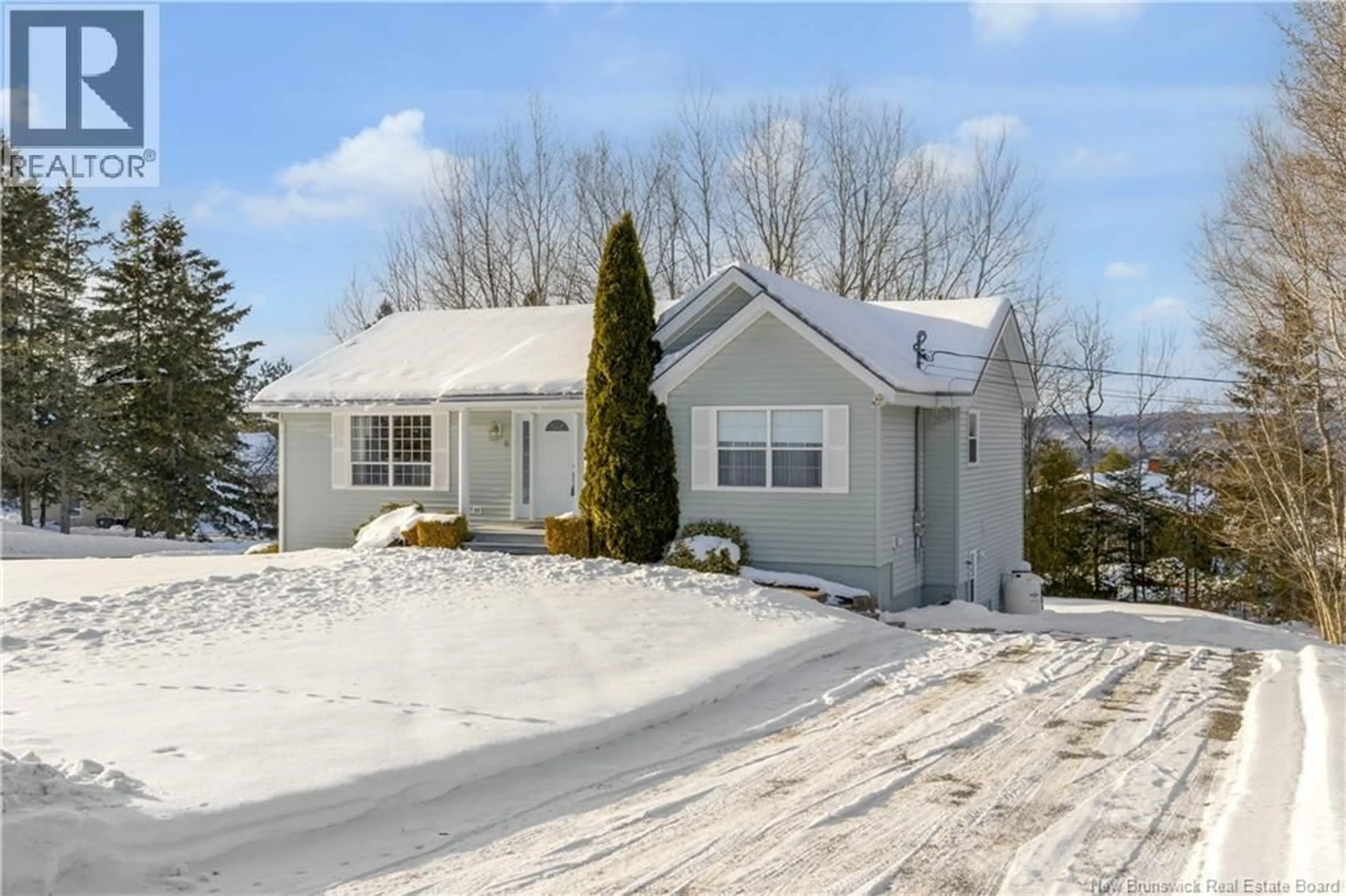 Home with vinyl exterior material, street for 6 MCMASTER AVENUE, Nauwigewauk New Brunswick E5N2B7