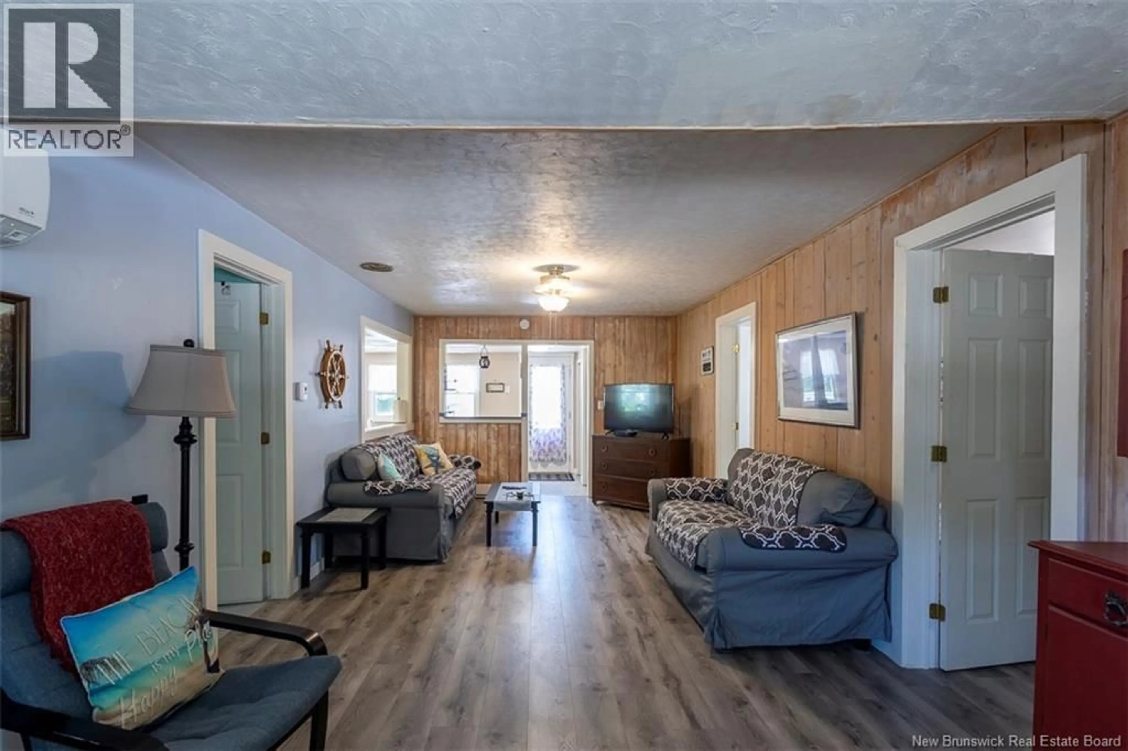 Living room with furniture, wood/laminate floor for 51 FIRST AVENUE, Pointe-Du-Chêne New Brunswick E4P4E8