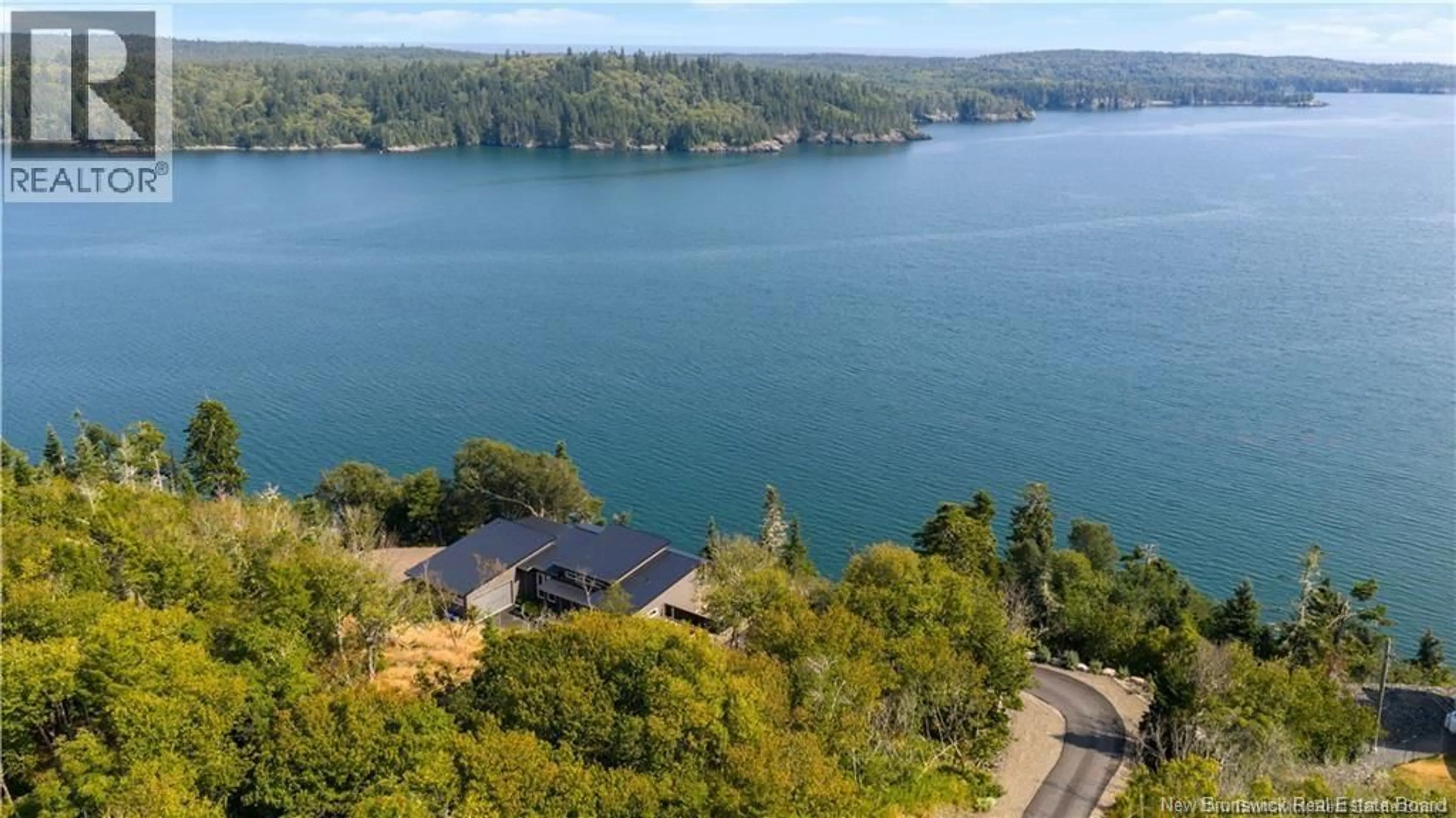 A pic from outside/outdoor area/front of a property/back of a property/a pic from drone, water/lake/river/ocean view for 30-15 WAITES LANE, Beaver Harbour New Brunswick E5H1K8