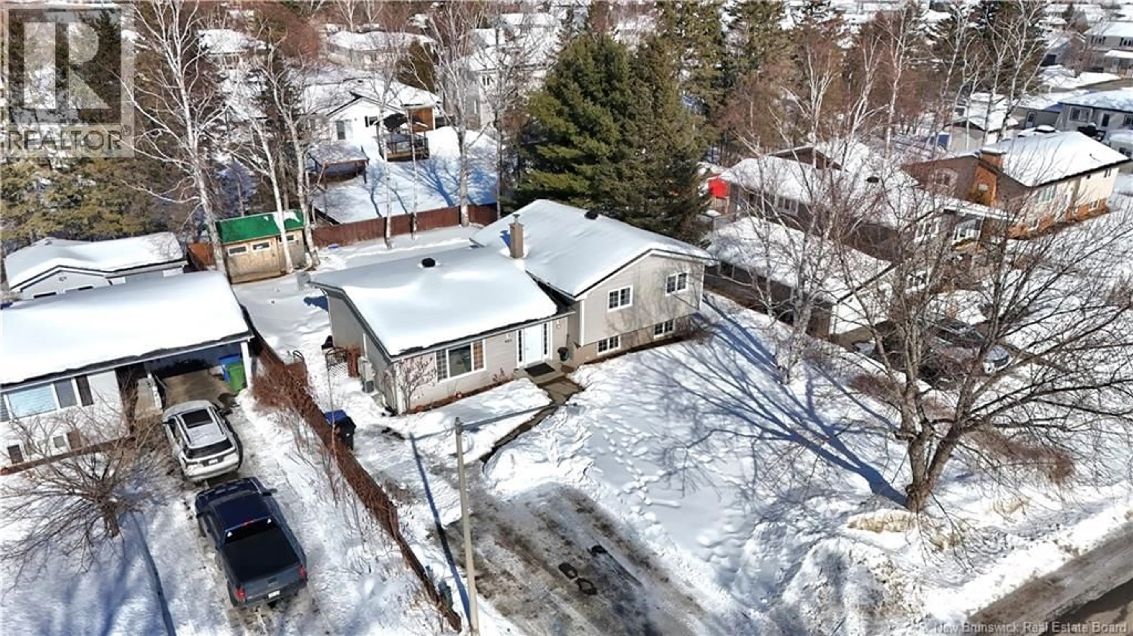 A pic from outside/outdoor area/front of a property/back of a property/a pic from drone, street for 960 MSGR GODIN, Bathurst New Brunswick E2A4E6