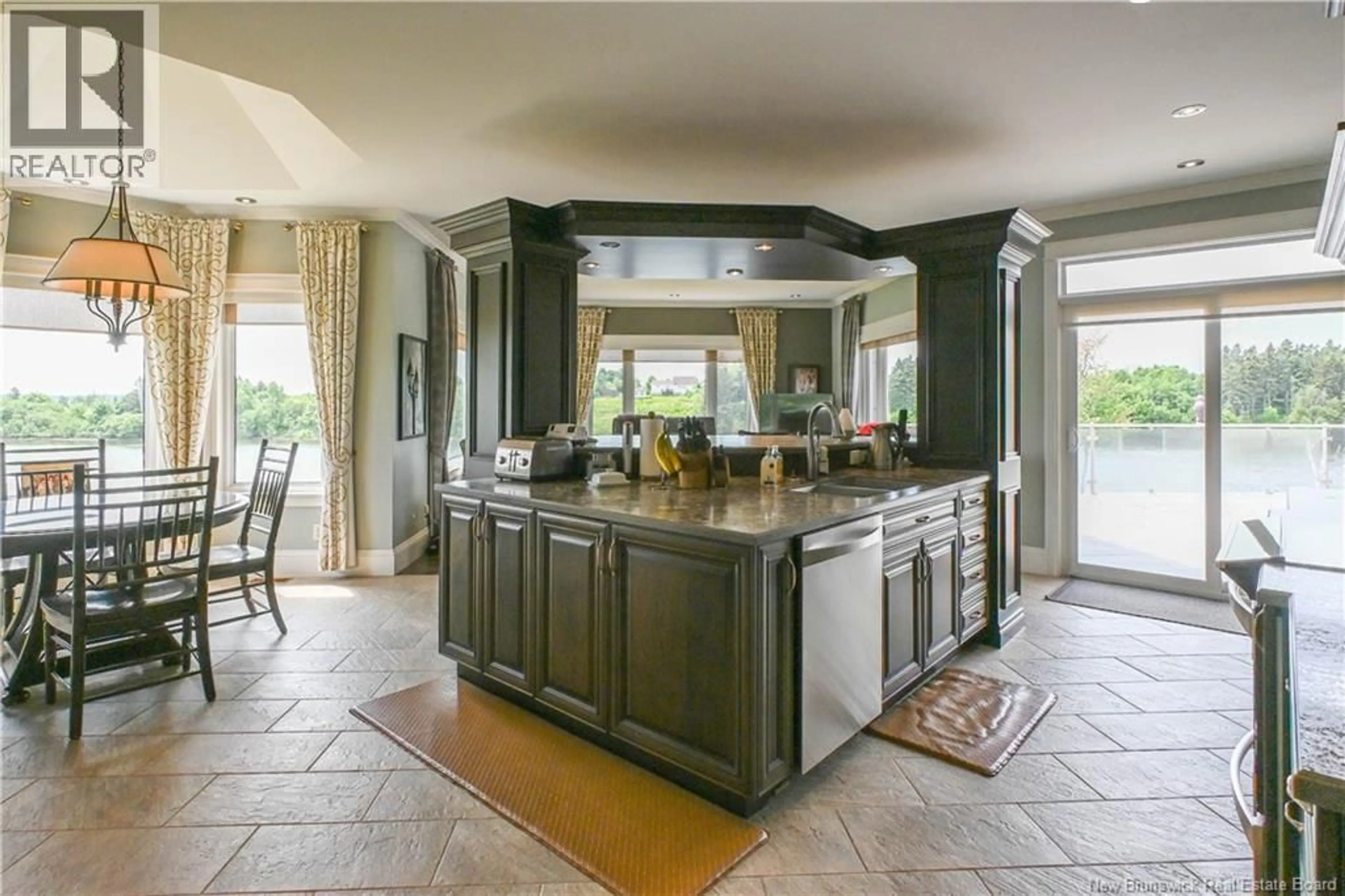 Open concept kitchen, ceramic/tile floor for 4261 RUE ANTHONY STREET, Tracadie New Brunswick E1X1C2