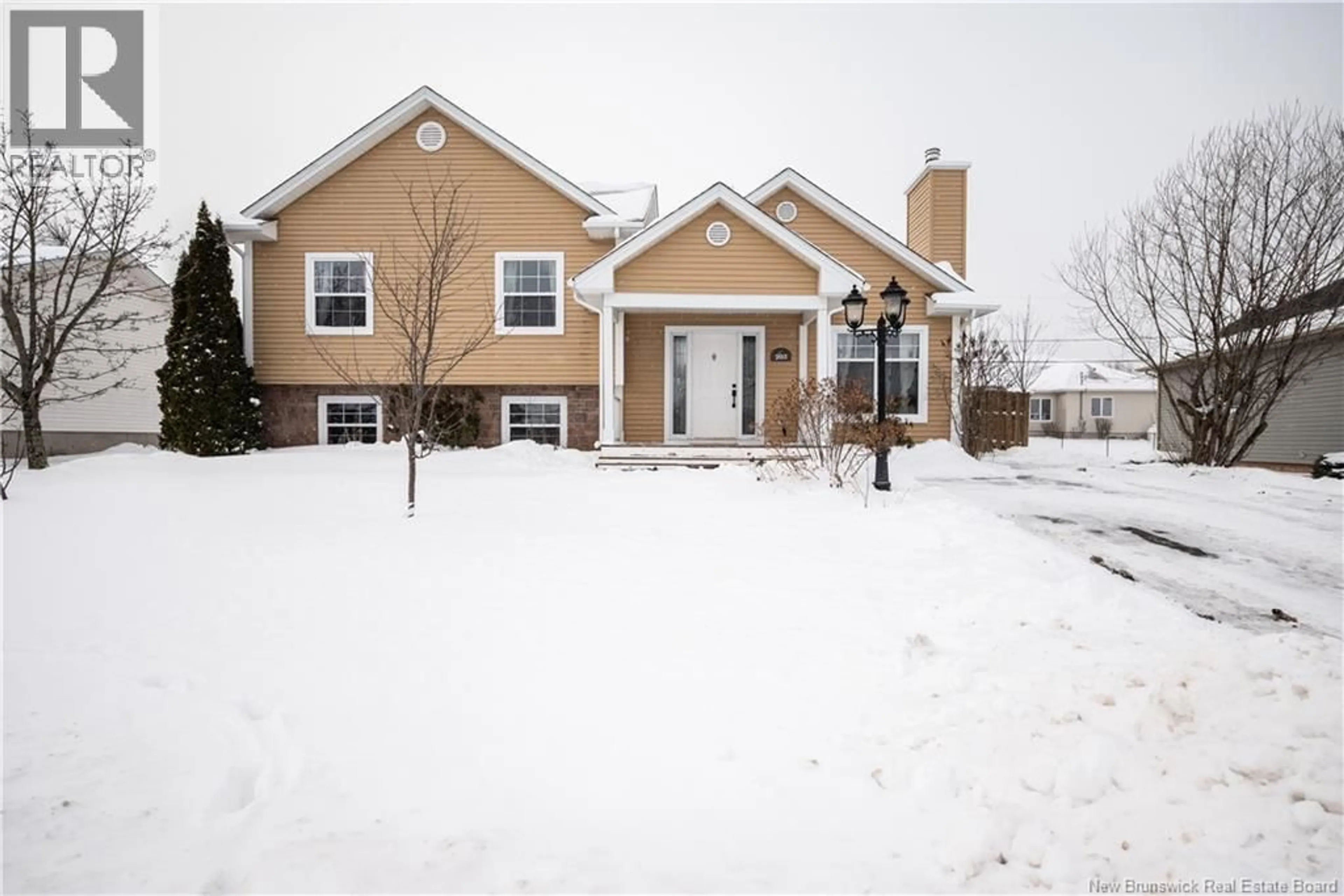 Home with vinyl exterior material, street for 203 SUNSHINE DRIVE, Moncton New Brunswick E1G2J6