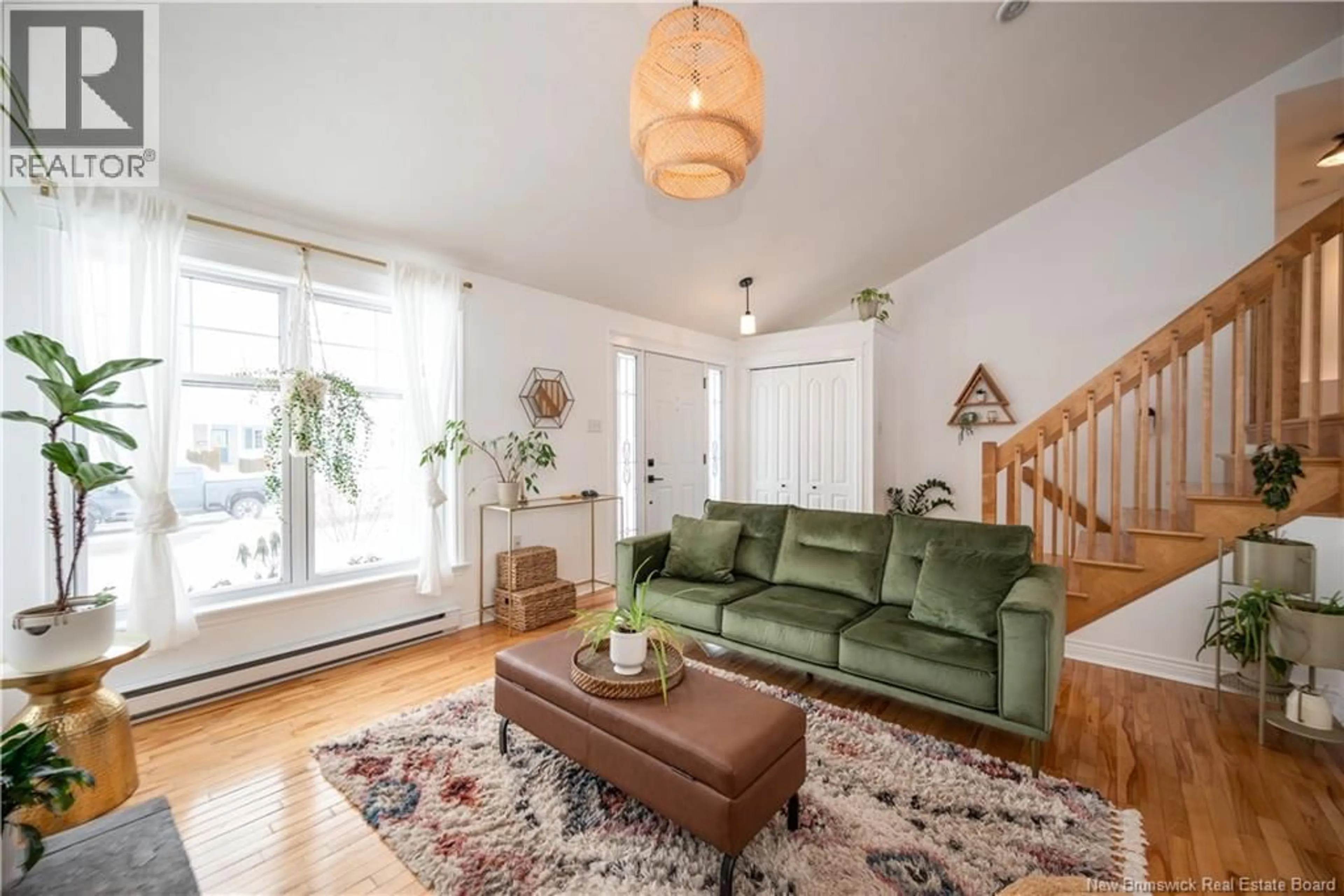 Living room with furniture, unknown for 203 SUNSHINE DRIVE, Moncton New Brunswick E1G2J6