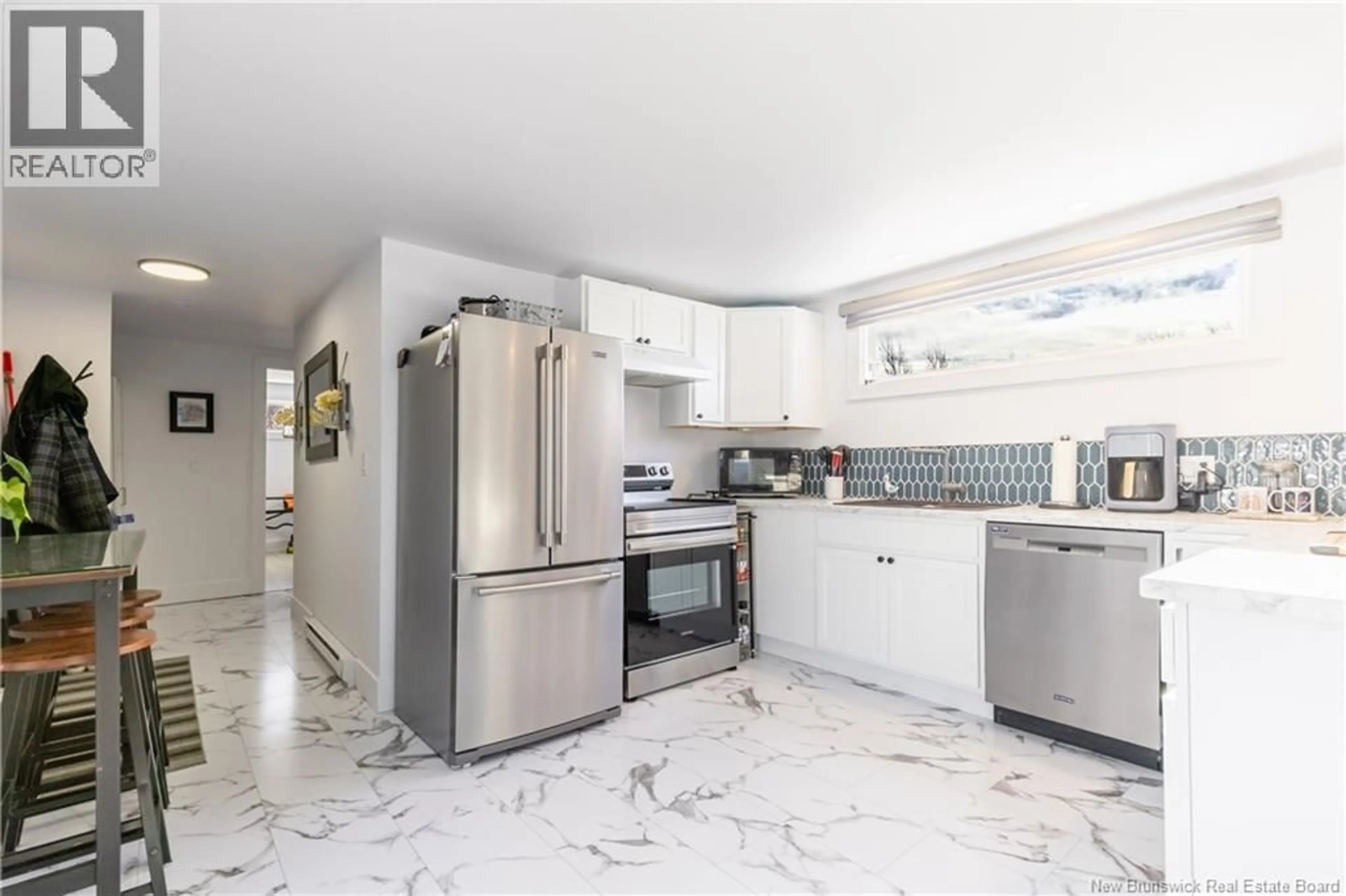 Open concept kitchen, ceramic/tile floor for 22 ELMDALE CRESCENT, Fredericton New Brunswick E3B6R1