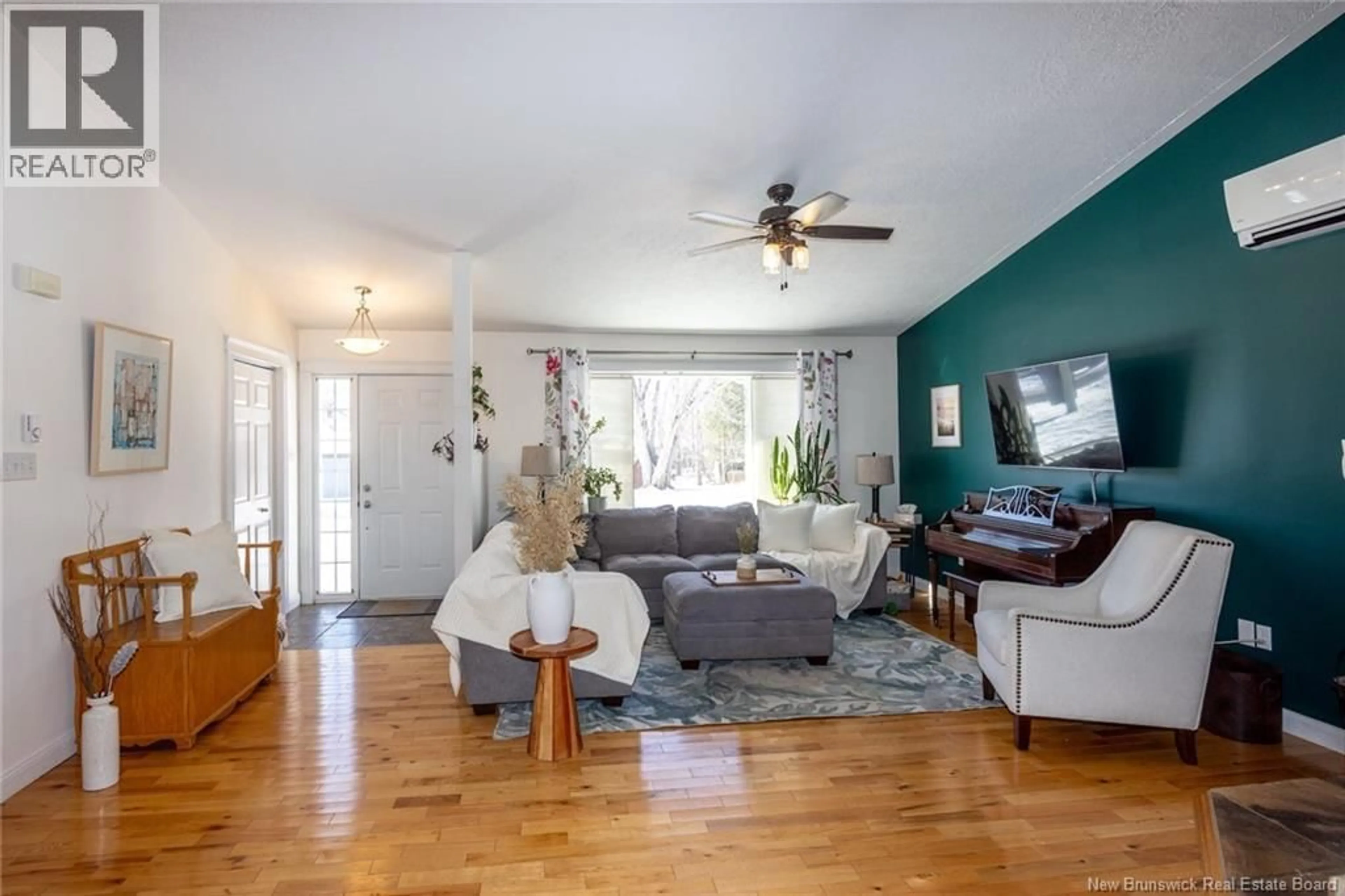 Living room with furniture, wood/laminate floor for 1 BIRCH CRESCENT, Fredericton New Brunswick E3A3S8