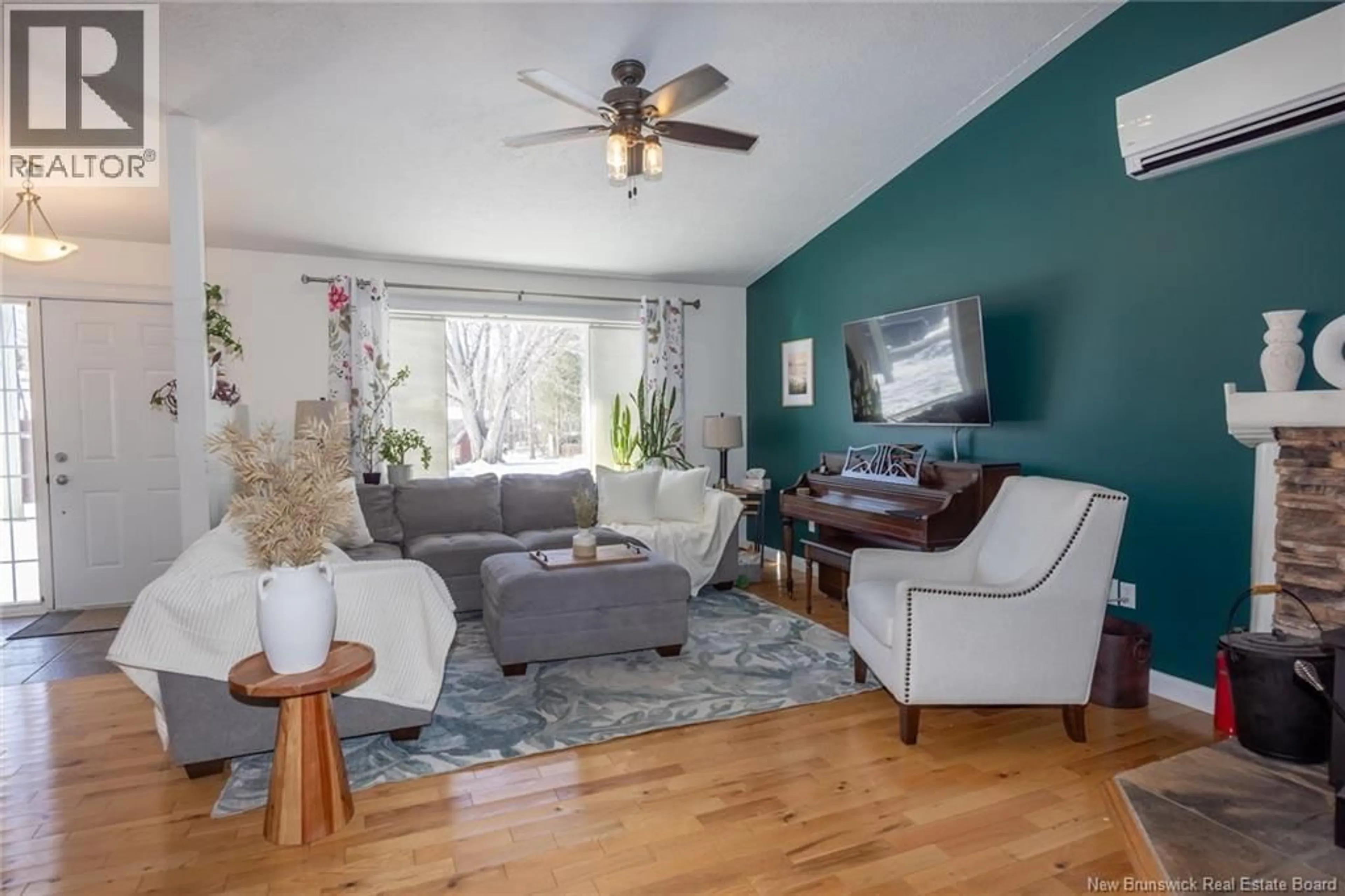 Living room with furniture, wood/laminate floor for 1 BIRCH CRESCENT, Fredericton New Brunswick E3A3S8