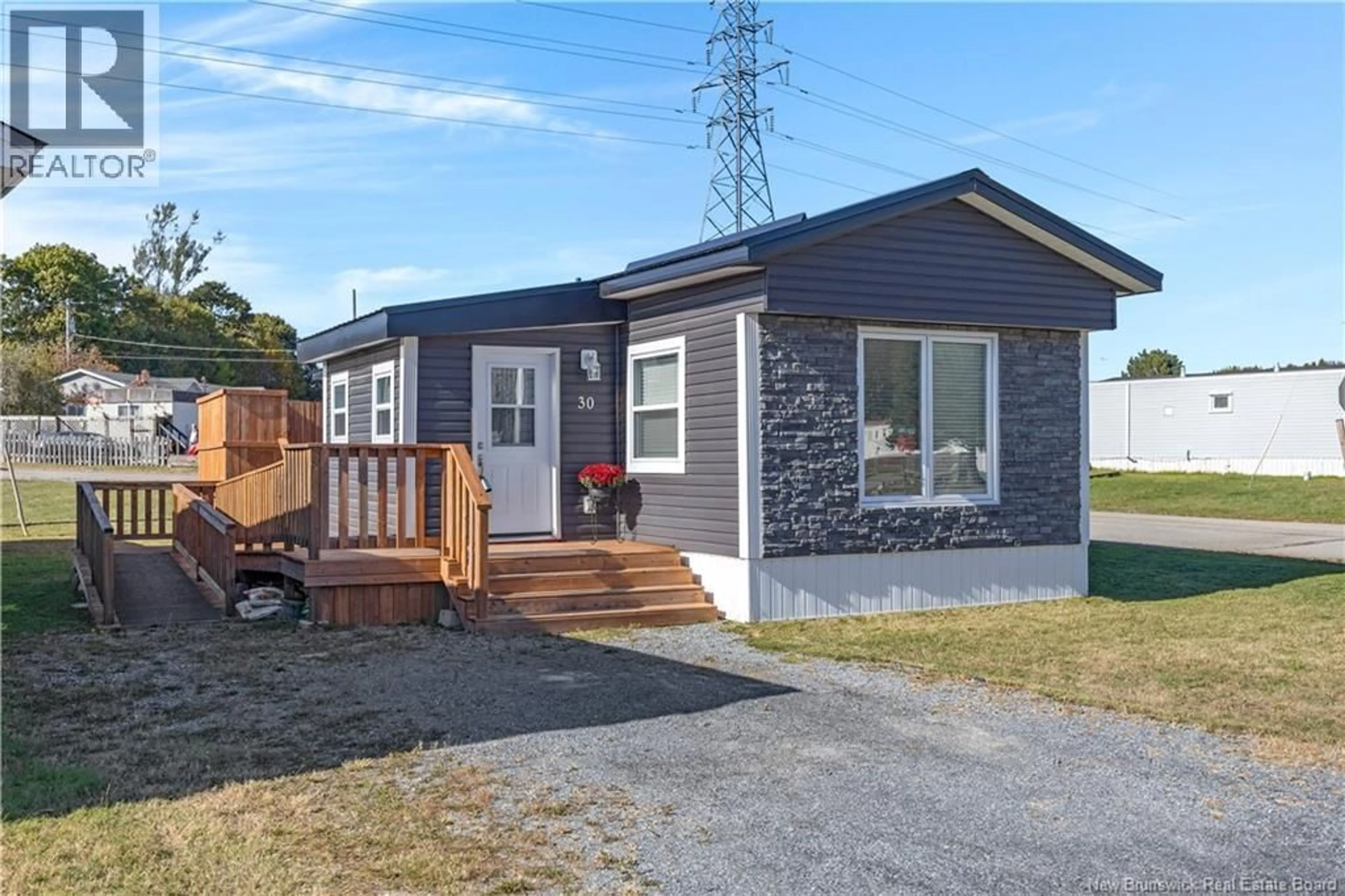 Home with vinyl exterior material, street for 30 VIOLET STREET, Saint John New Brunswick E2M5N2