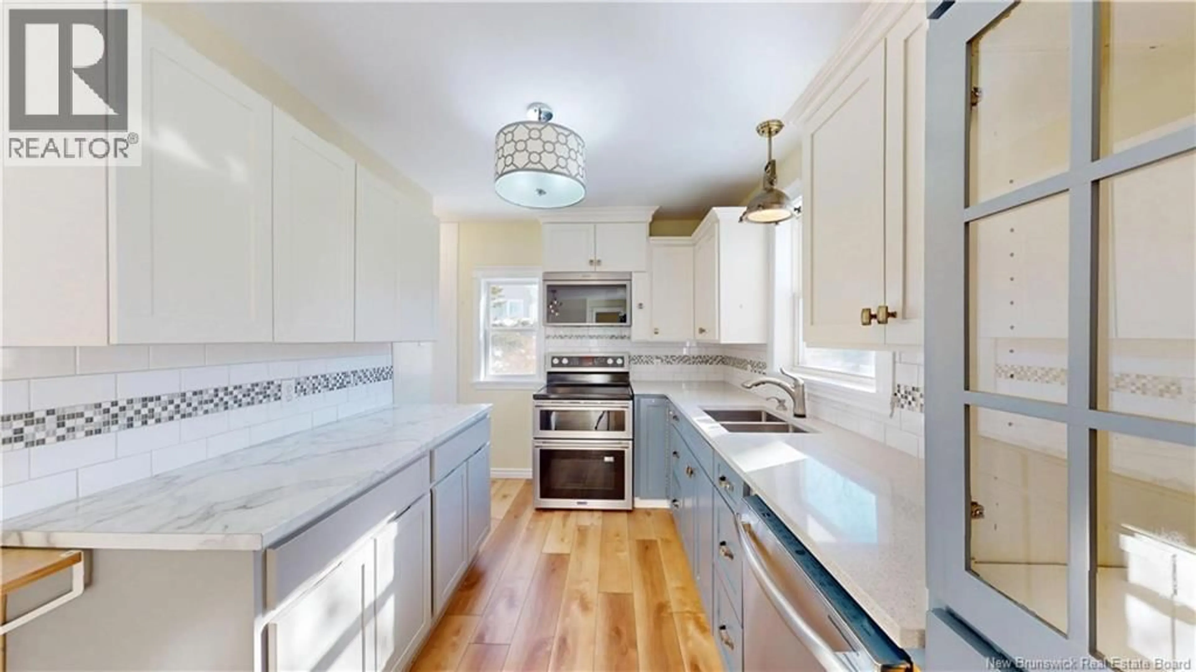 Open concept kitchen, ceramic/tile floor for 15 ARNOLD AVENUE, Sussex New Brunswick E4E1Y3