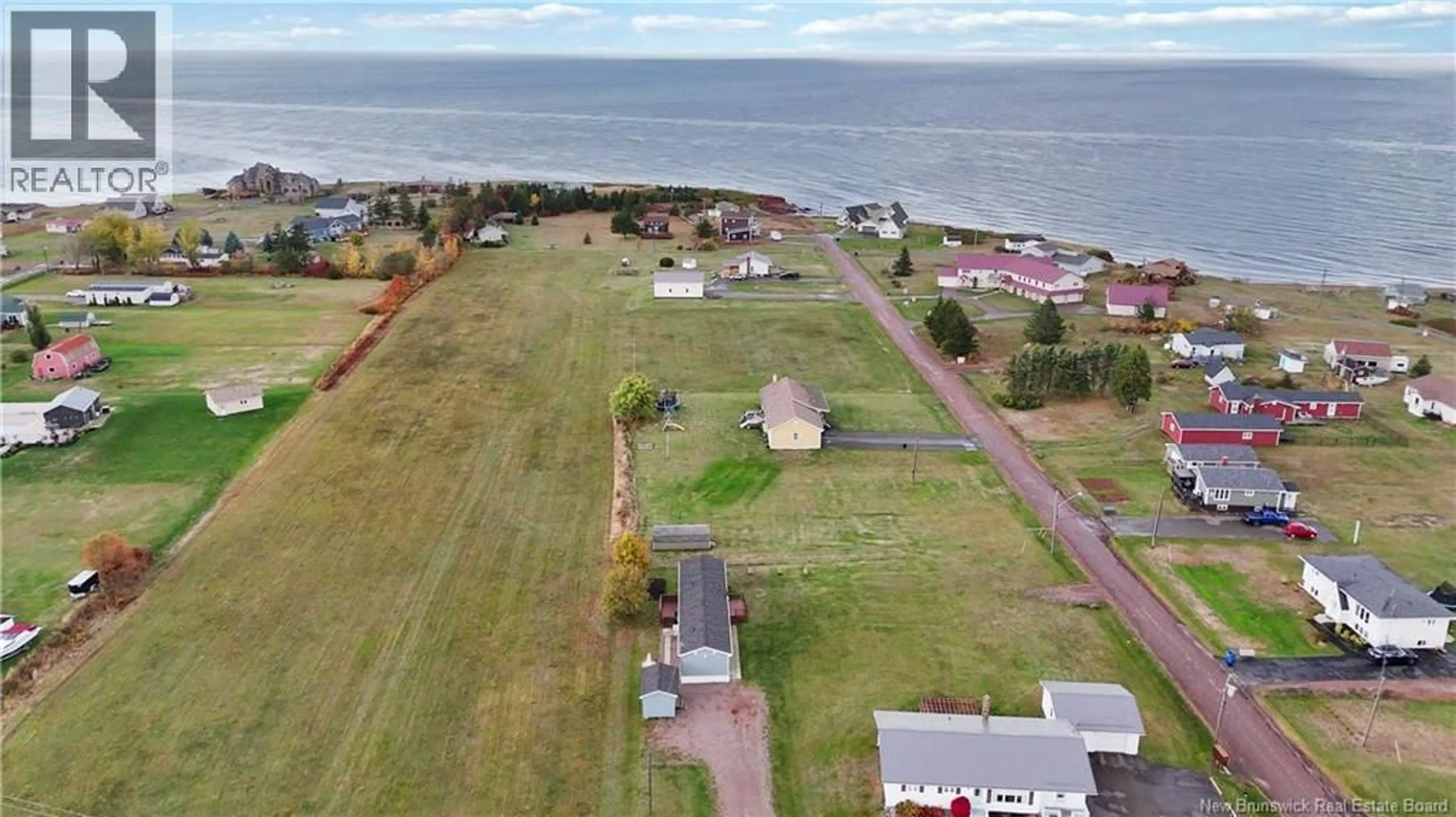 A pic from outside/outdoor area/front of a property/back of a property/a pic from drone, water/lake/river/ocean view for 670 BAS-CAP-PELE ROAD, Cap-Pelé New Brunswick E4N1J5