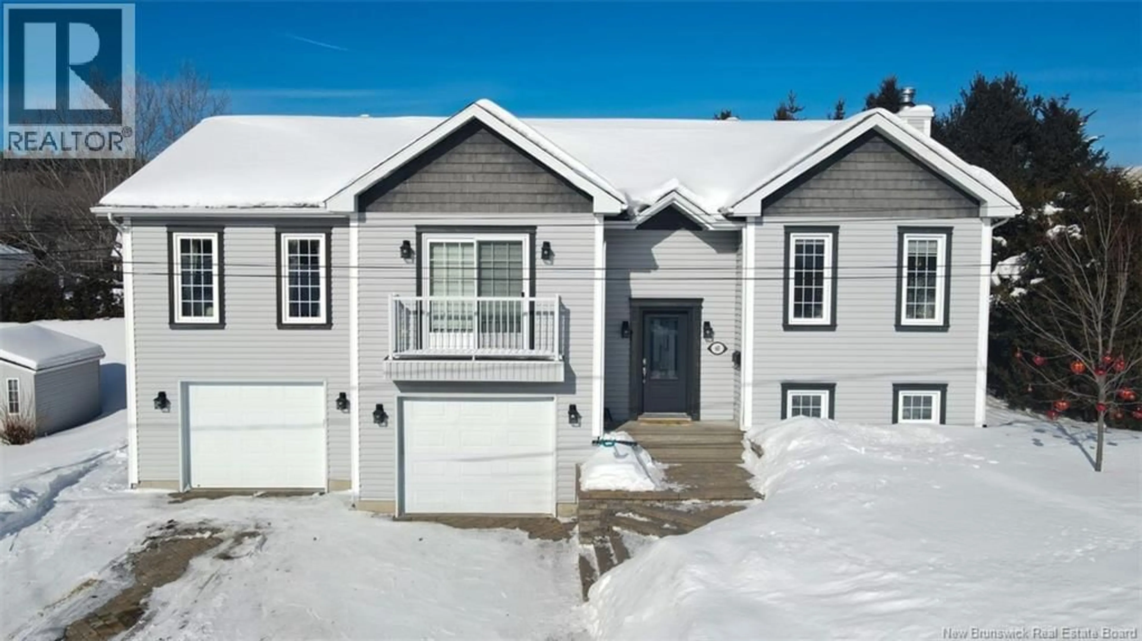 Home with vinyl exterior material, street for 60 MGR DIONNE AVENUE, Edmundston New Brunswick E3V4Y7