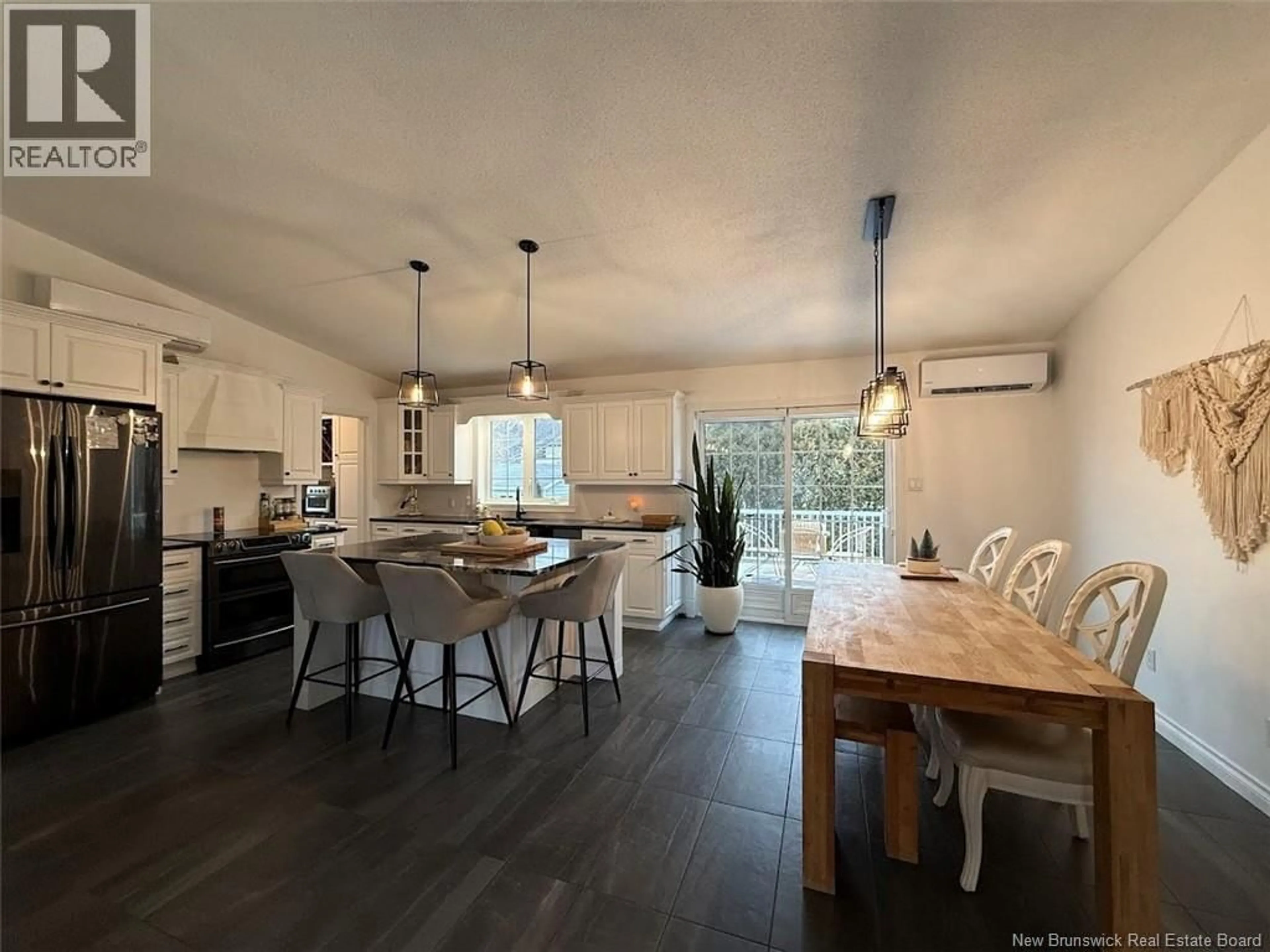 Open concept kitchen, wood/laminate floor for 60 MGR DIONNE AVENUE, Edmundston New Brunswick E3V4Y7