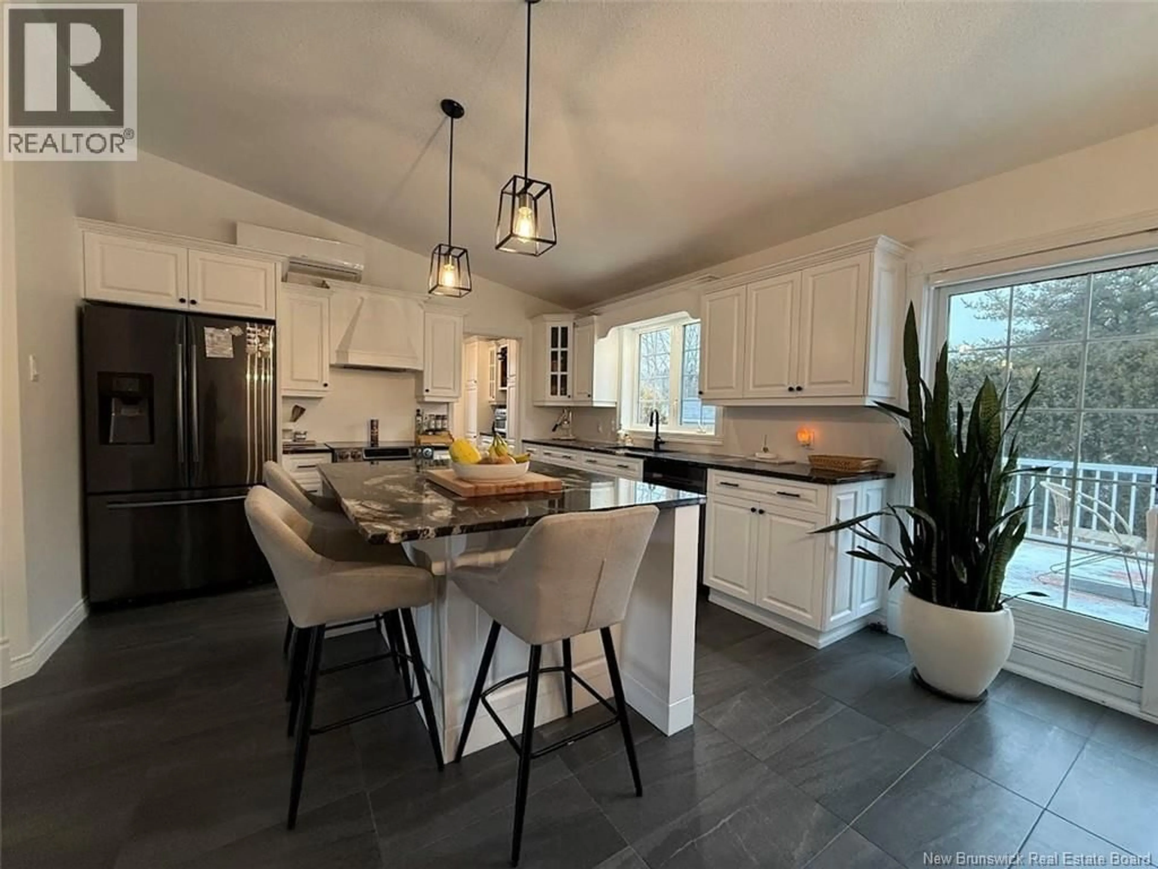 Open concept kitchen, ceramic/tile floor for 60 MGR DIONNE AVENUE, Edmundston New Brunswick E3V4Y7