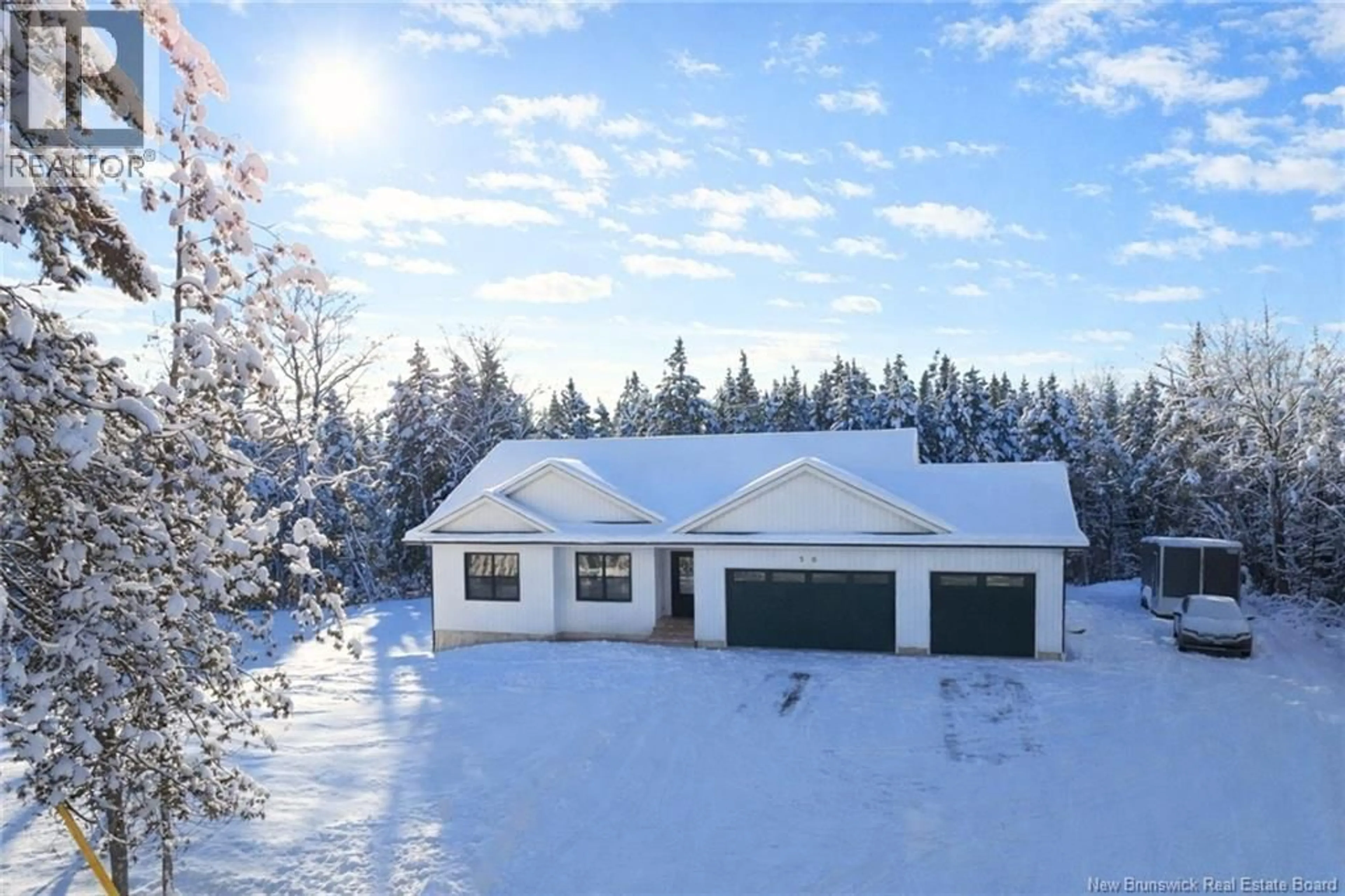 A pic from outside/outdoor area/front of a property/back of a property/a pic from drone, water/lake/river/ocean view for 50 CHAMBERLAIN ROAD, Quispamsis New Brunswick E2G1C1