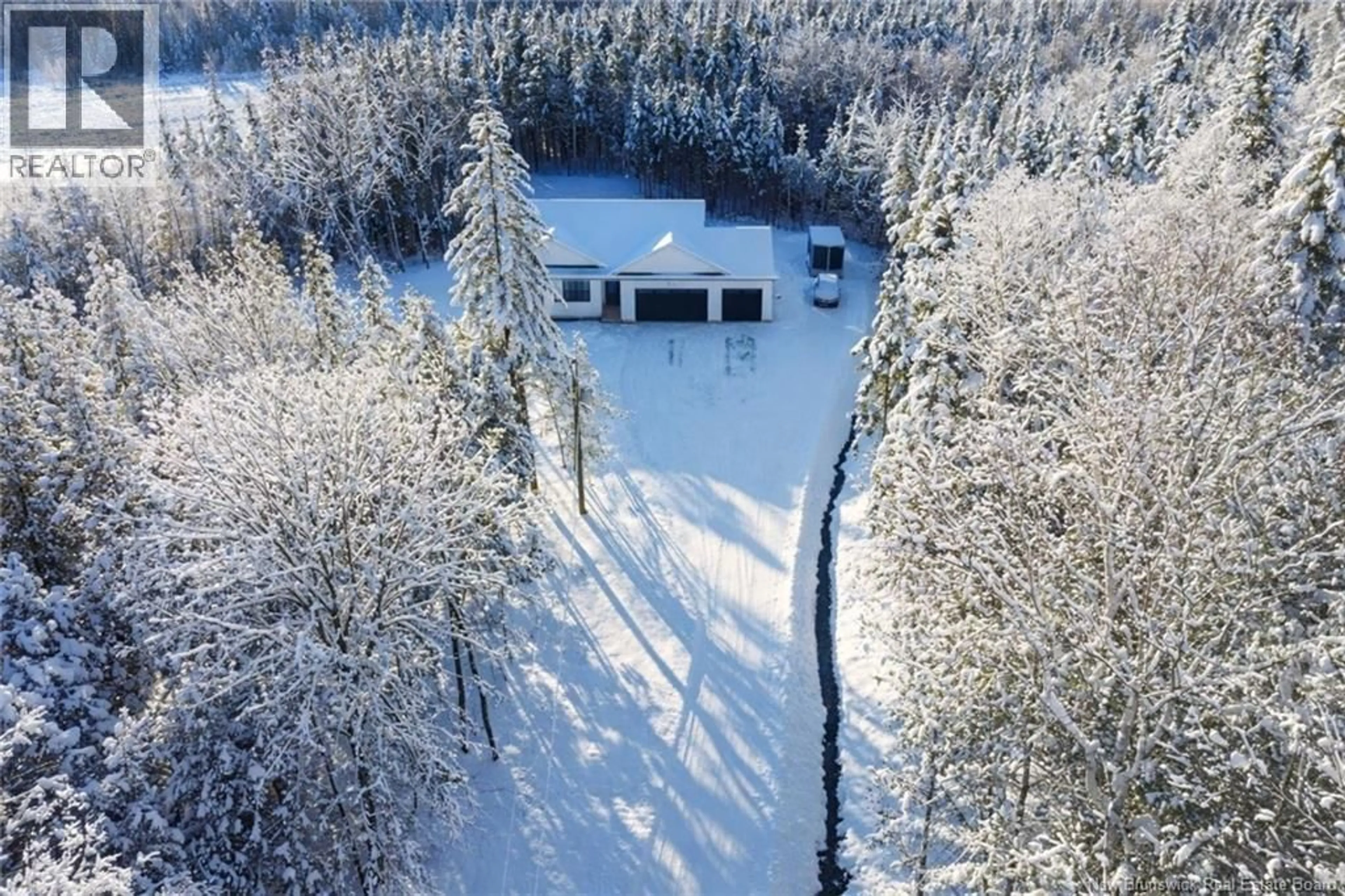 A pic from outside/outdoor area/front of a property/back of a property/a pic from drone, unknown for 50 CHAMBERLAIN ROAD, Quispamsis New Brunswick E2G1C1