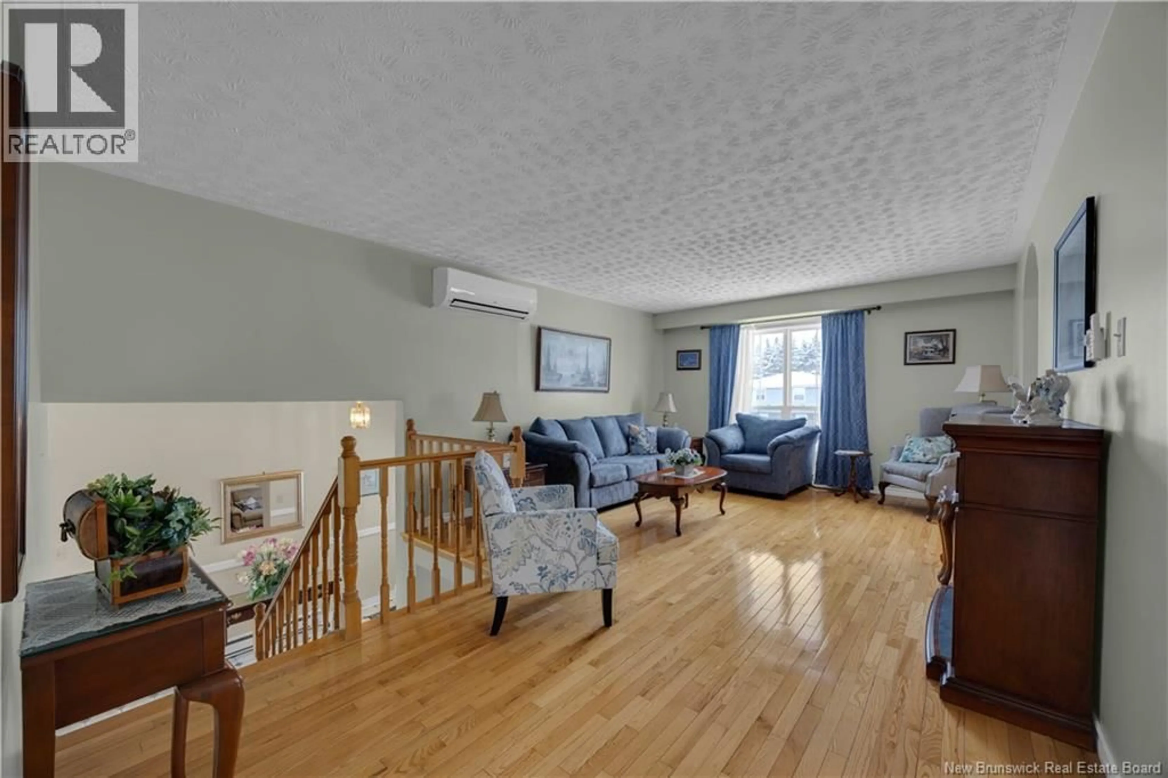 Living room with furniture, wood/laminate floor for 159 BON ACCORD DRIVE, Saint John New Brunswick E2J4K5