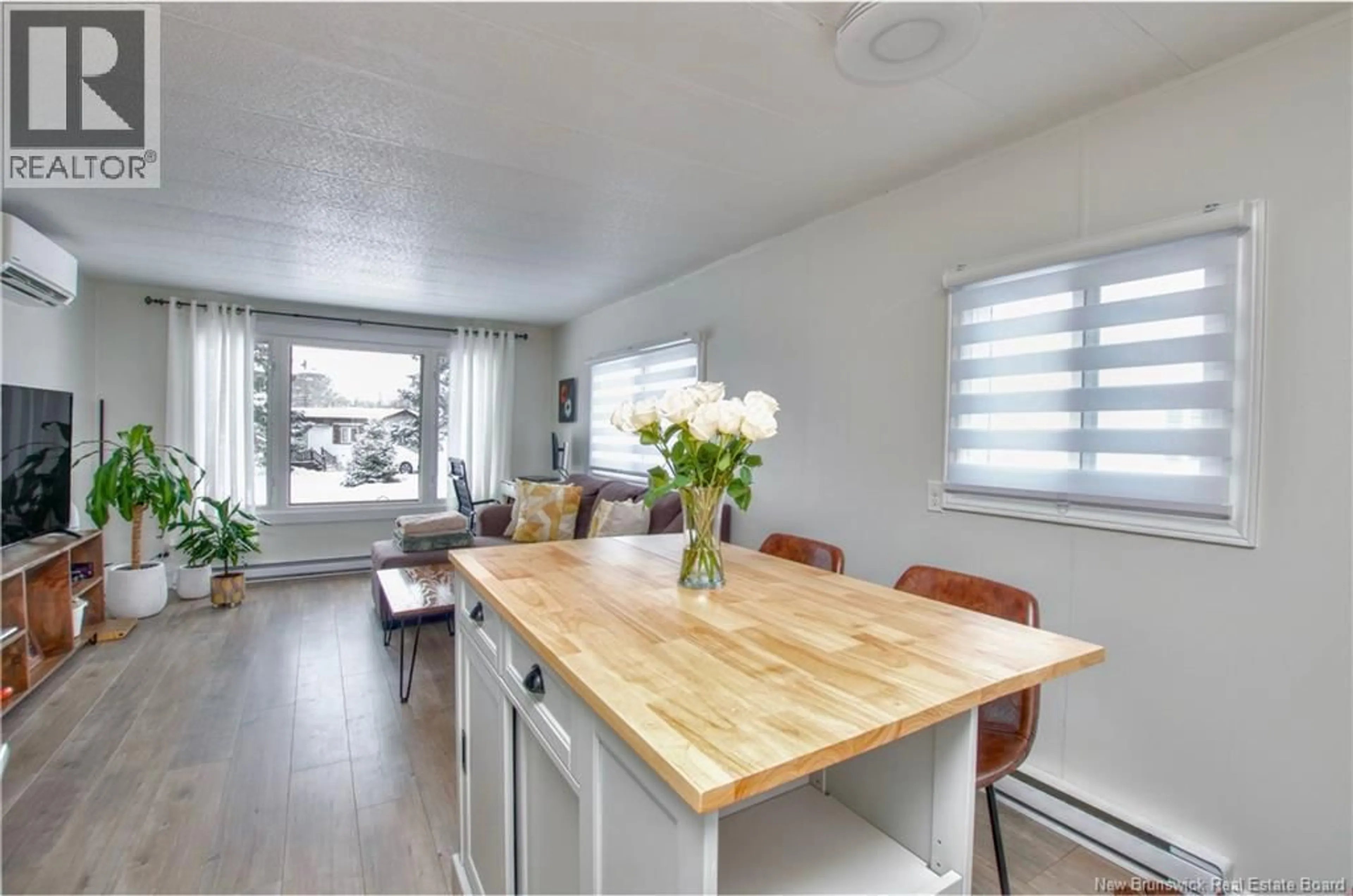 Open concept kitchen, wood/laminate floor for 8 THIRD STREET, Lakeville New Brunswick E1H1K7