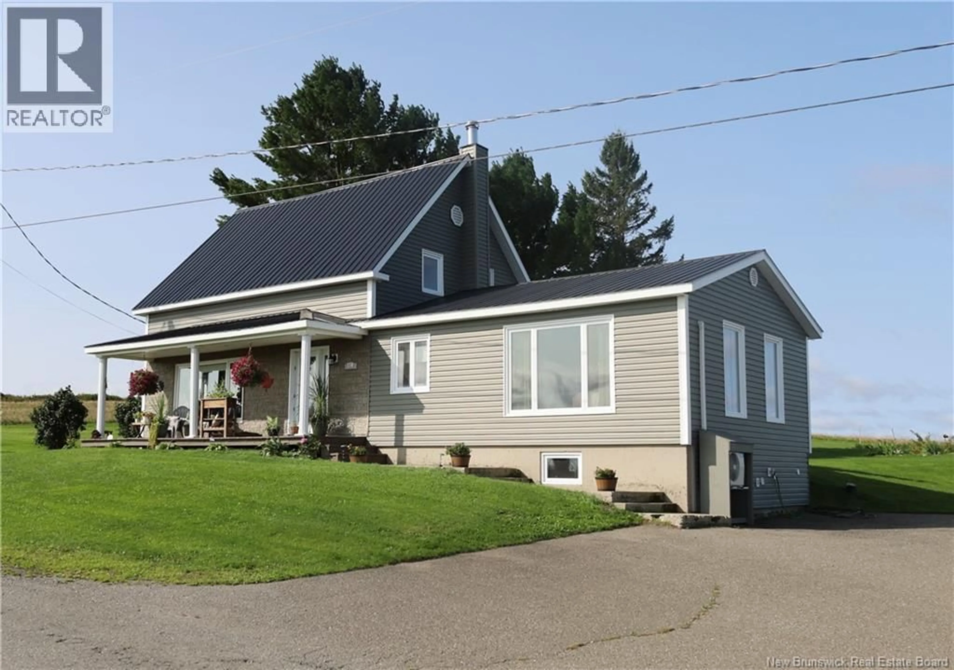 Home with vinyl exterior material, street for 770 MONTAGNE A COMEAU, Saint-André New Brunswick E3Y3G5