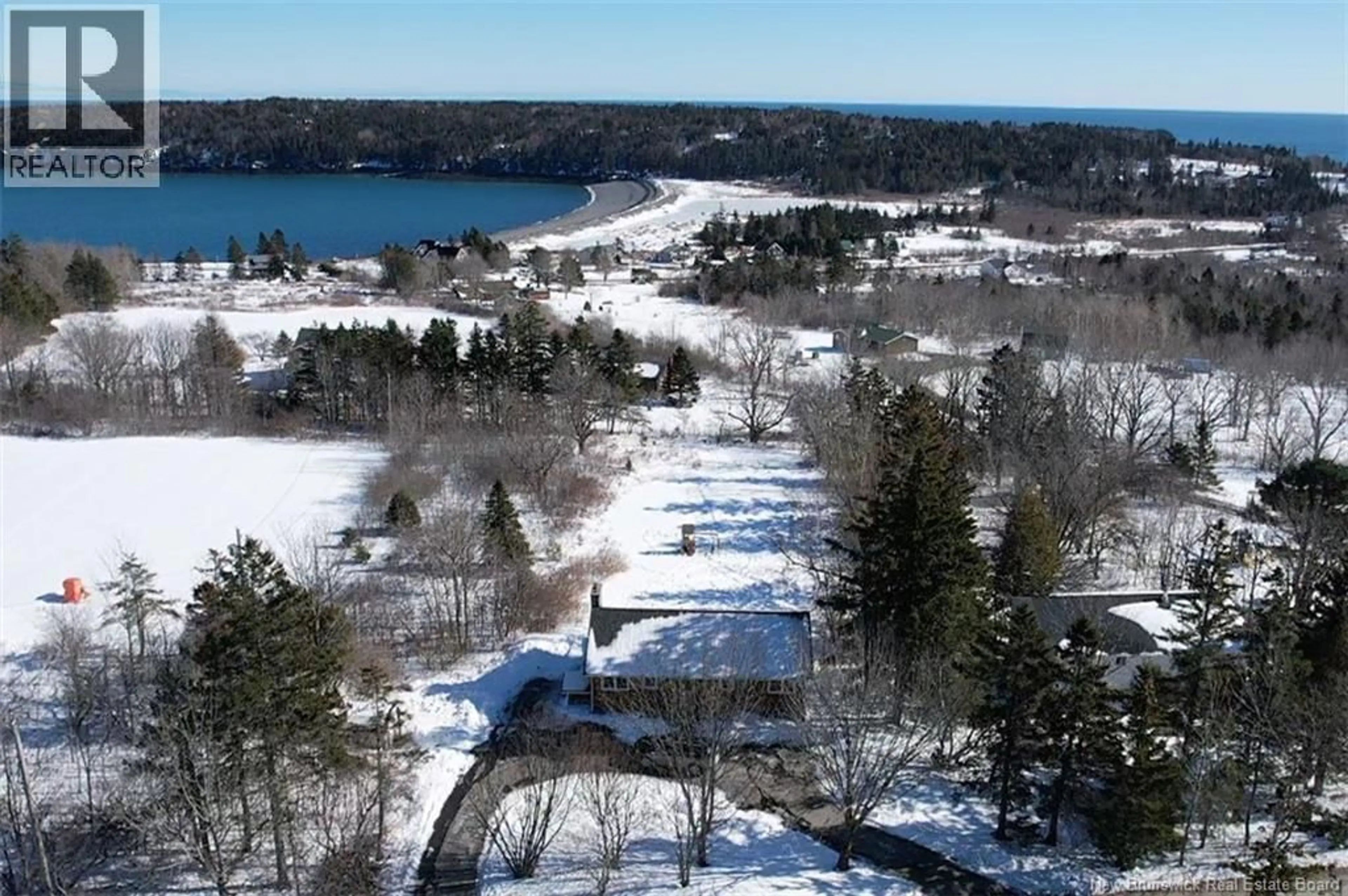 A pic from outside/outdoor area/front of a property/back of a property/a pic from drone, water/lake/river/ocean view for 94 WHISTLE ROAD, Grand Manan New Brunswick E5G1B3