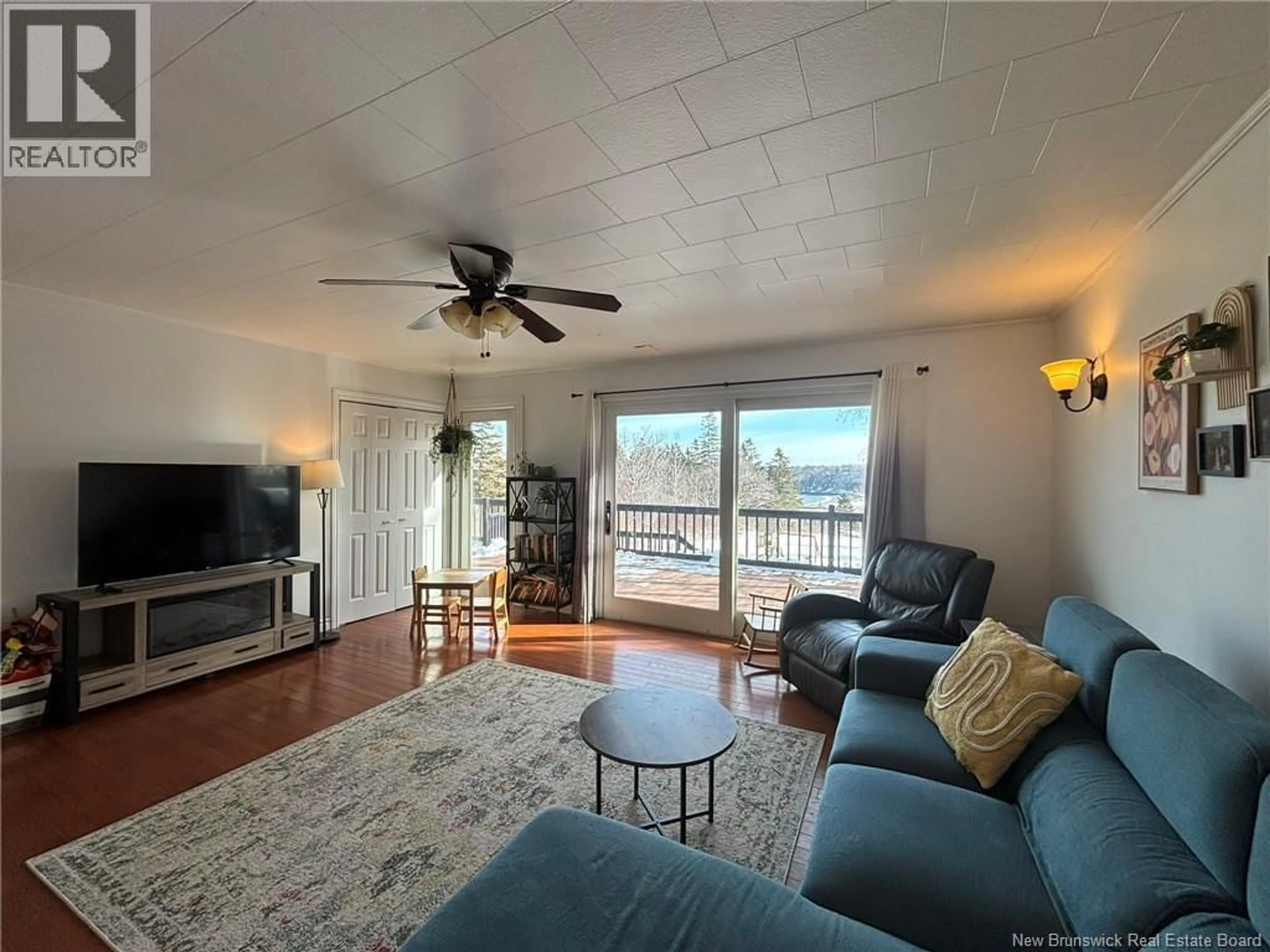 Living room with furniture, unknown for 94 WHISTLE ROAD, Grand Manan New Brunswick E5G1B3