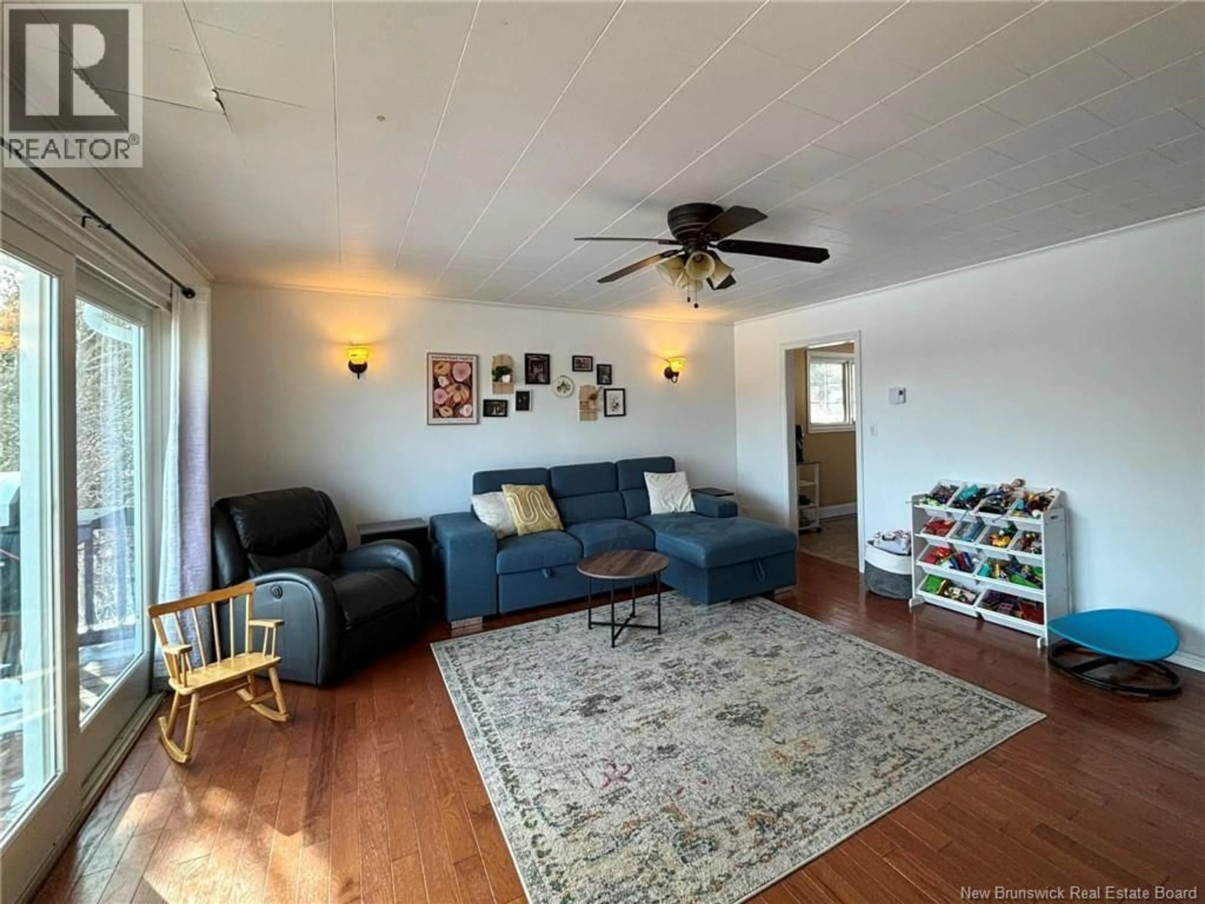 Living room with furniture, unknown for 94 WHISTLE ROAD, Grand Manan New Brunswick E5G1B3